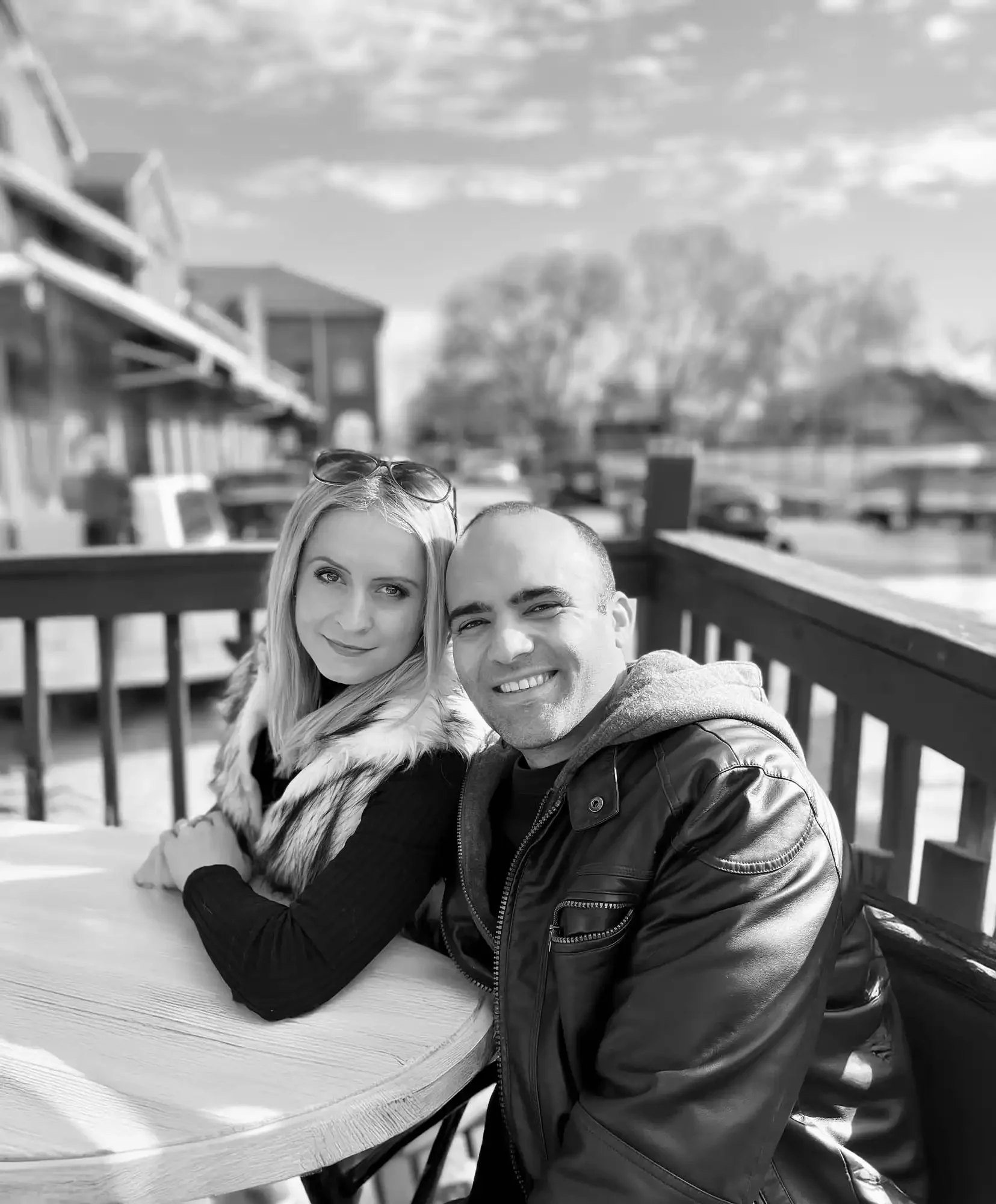 A black and white portrait of Bryant and Aliona Bonano, the husband-and-wife founders of Imperium Heating & Cooling in St. Louis.