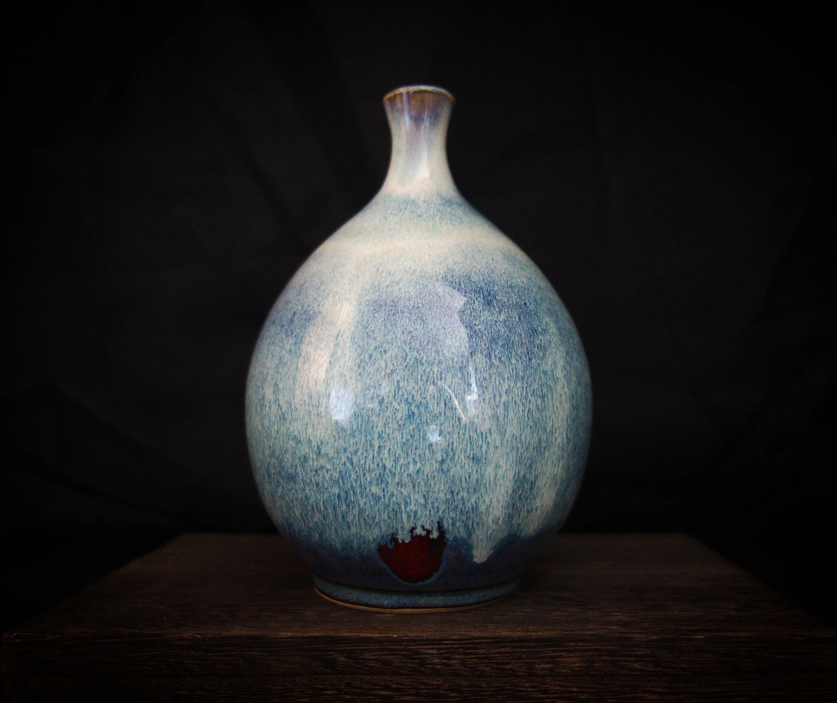 Howdy, its been a while since I've posted as I have been super caught up with stuff and have not had much of a chance to sit down and make some posts!

These two pots are from the latest batch of pots I've made and I'm really happy with the glazes th