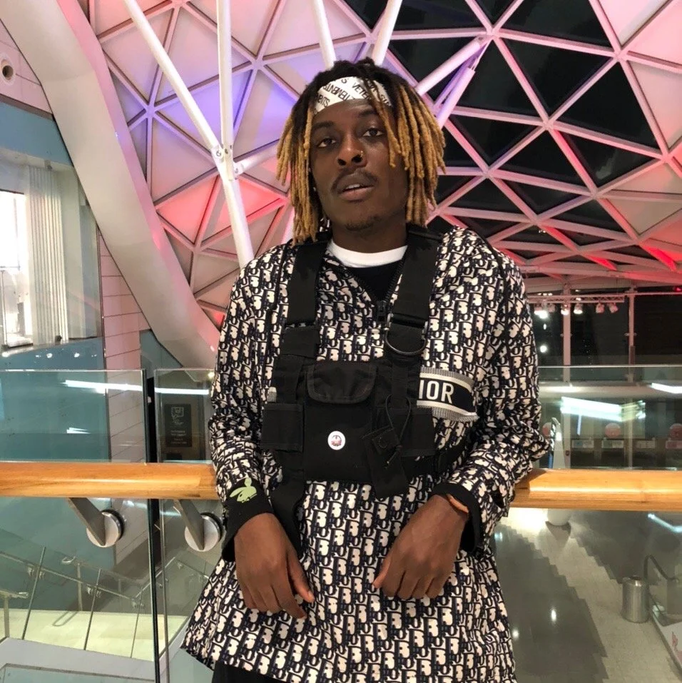 Image of Musical Artist/Rapper Young Gstar in Dior Jacket at Westfield White City