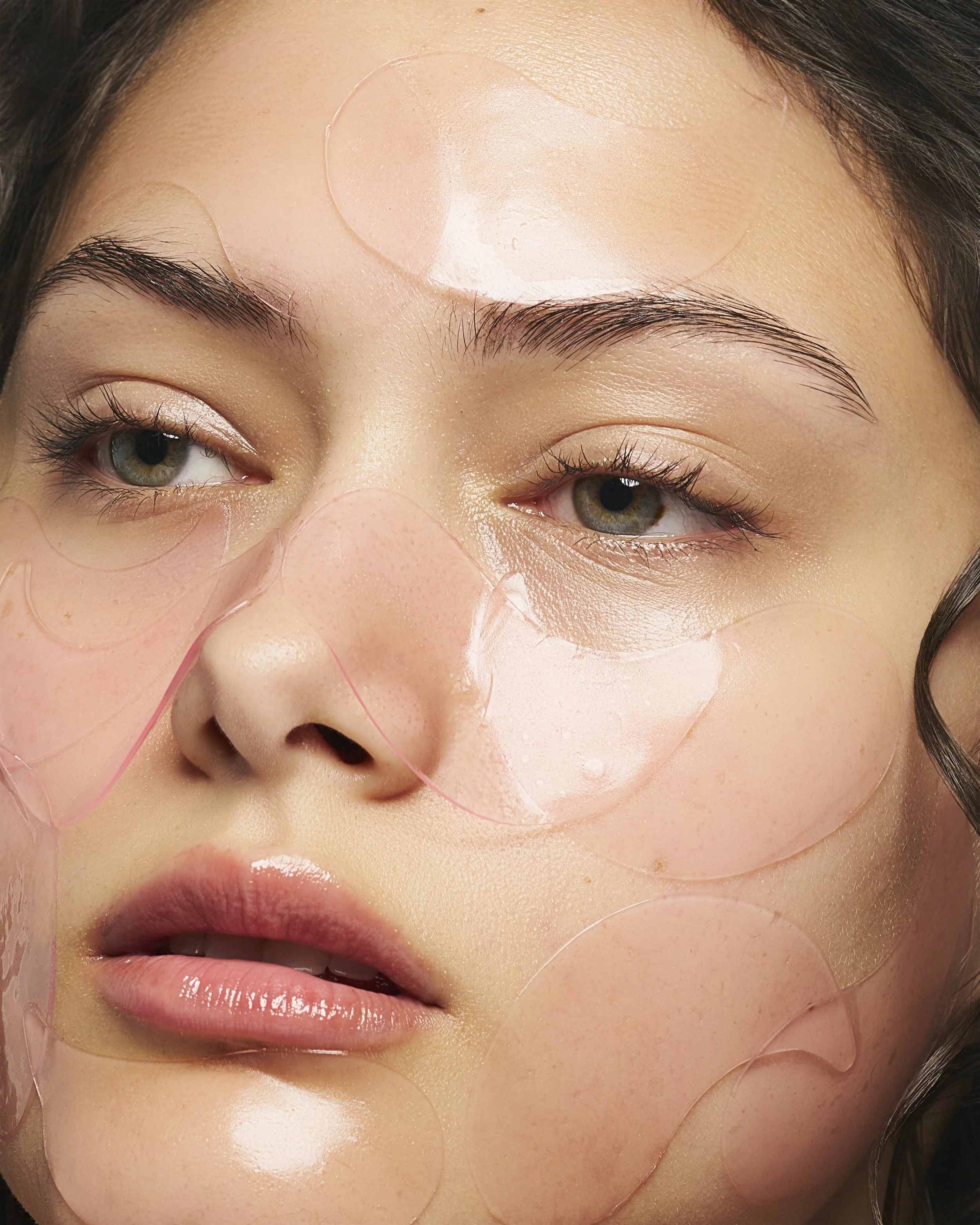 Clean and clear beauty skincare product featuring a glowing model with shiny cream application, highlighting hydration, radiance, and natural skin—perfect for skincare branding, e-commerce, and modern beauty campaigns.
