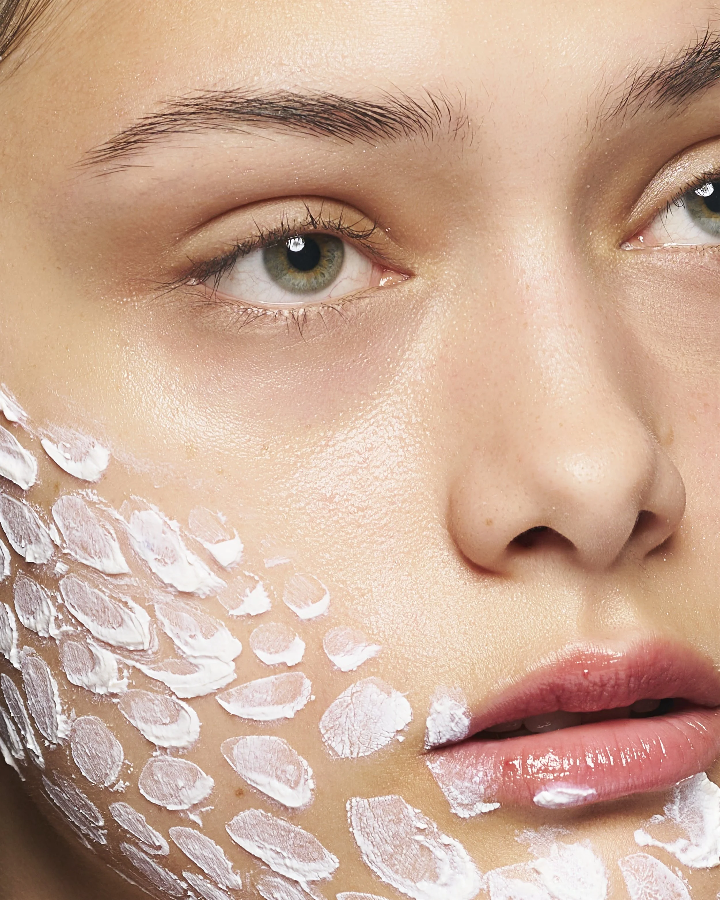 Clean beauty skincare product featuring a glowing model with textured cream application, highlighting hydration, radiance, and natural skin—perfect for skincare branding, e-commerce, and modern beauty campaigns.