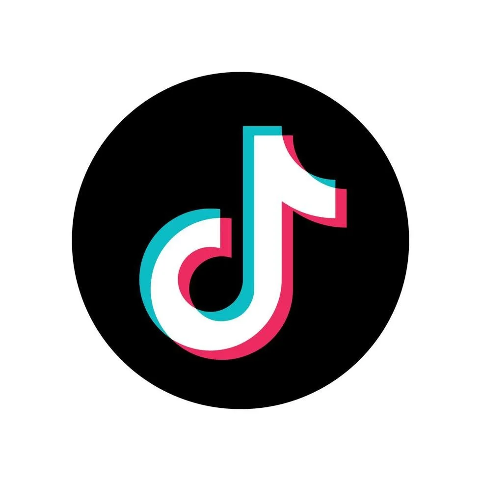 TikTok logo, black circle with musical note in white, red, and teal.