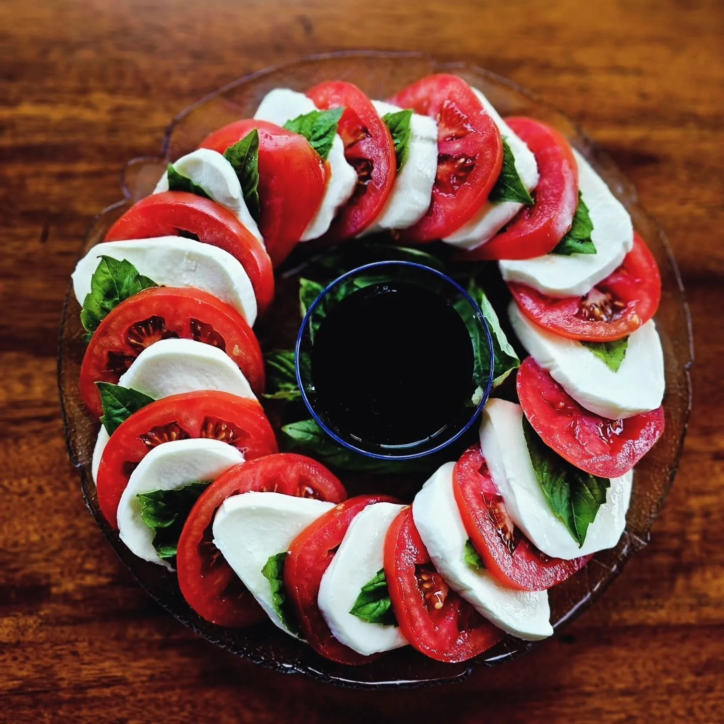 In the middle of winter, I always find myself craving something bright and fresh. When everything outside feels gray, these caprese skewers remind me that warmer days really are coming.
Fresh mozzarella, juicy tomatoes, basil, and a little balsamic &