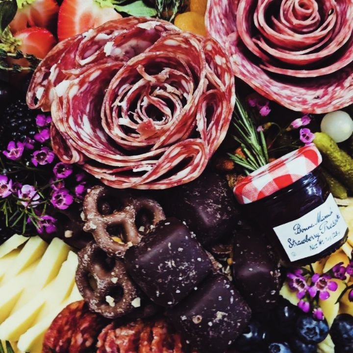 Here are some of my most asked questions!
Q: What comes on a board? A: Charcuterie meats, artisan cheeses, fruits, olives/pickles, dried fruits. sweets/chocolates, jams, and nuts, and herbs. 
Q: Can I personalize a board? A: Absolutely! Every board i