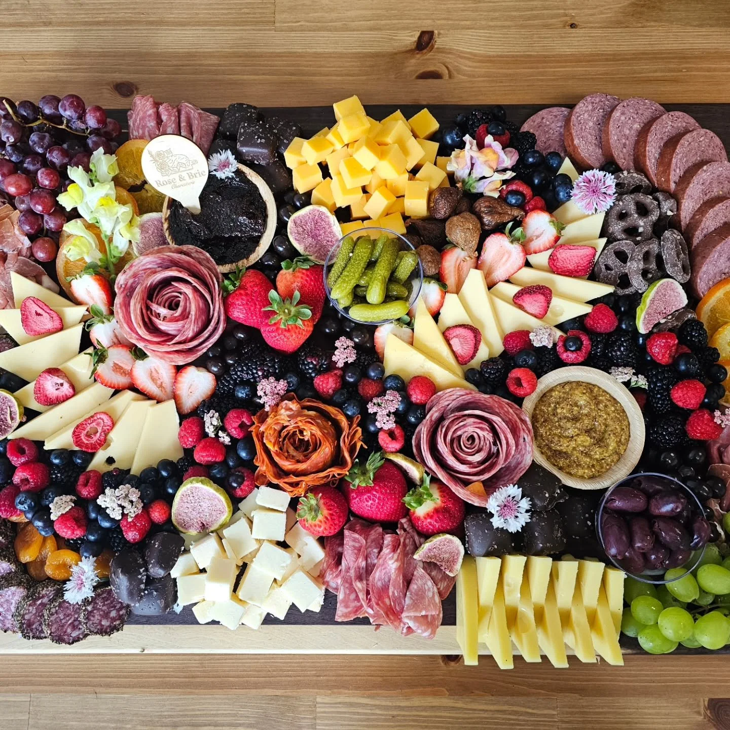A full baby shower spread built with love. Swipe through to see every detail, because the details are kind of our thing.
Featuring:
- Charcuterie Board
- Fruit &amp; Cheese Board 
- Veggie Board
- Caprese Skewers
- Sugar Cookies 

Featuring gorgeous 