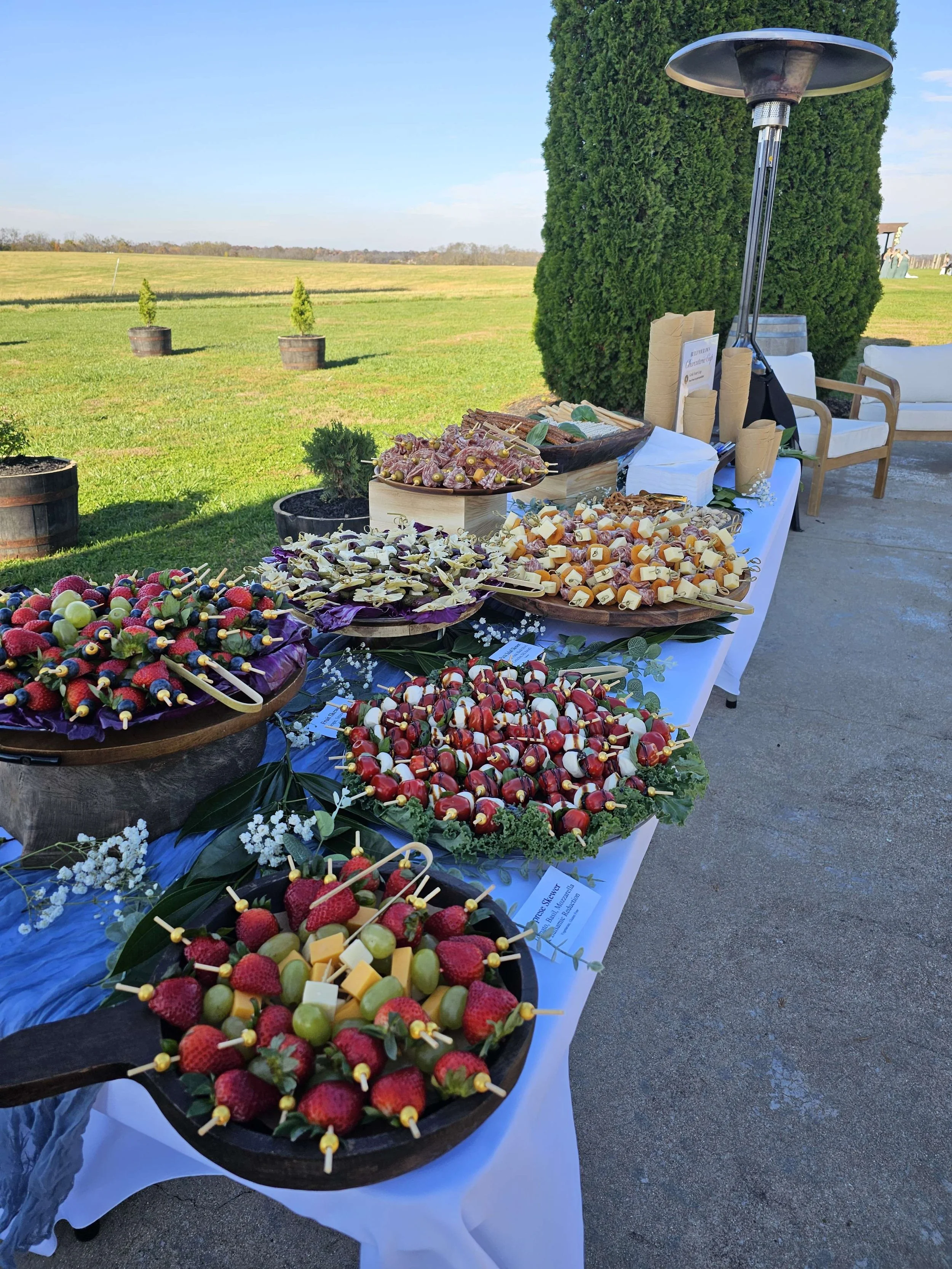 A Build Your Own Charcuterie Cup Table for Cocktail Hour at a Wedding