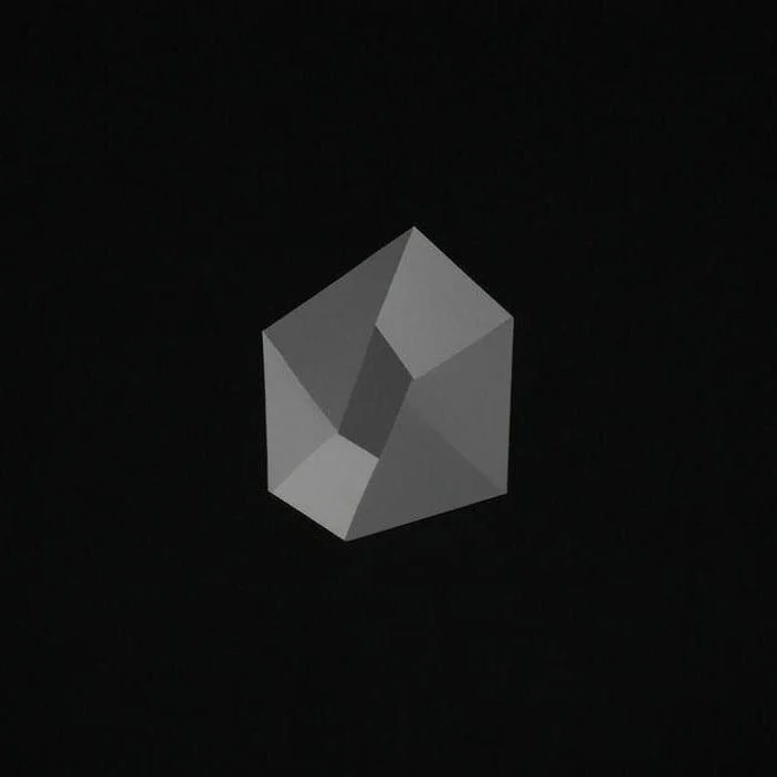 Gray geometric polyhedron on black background
