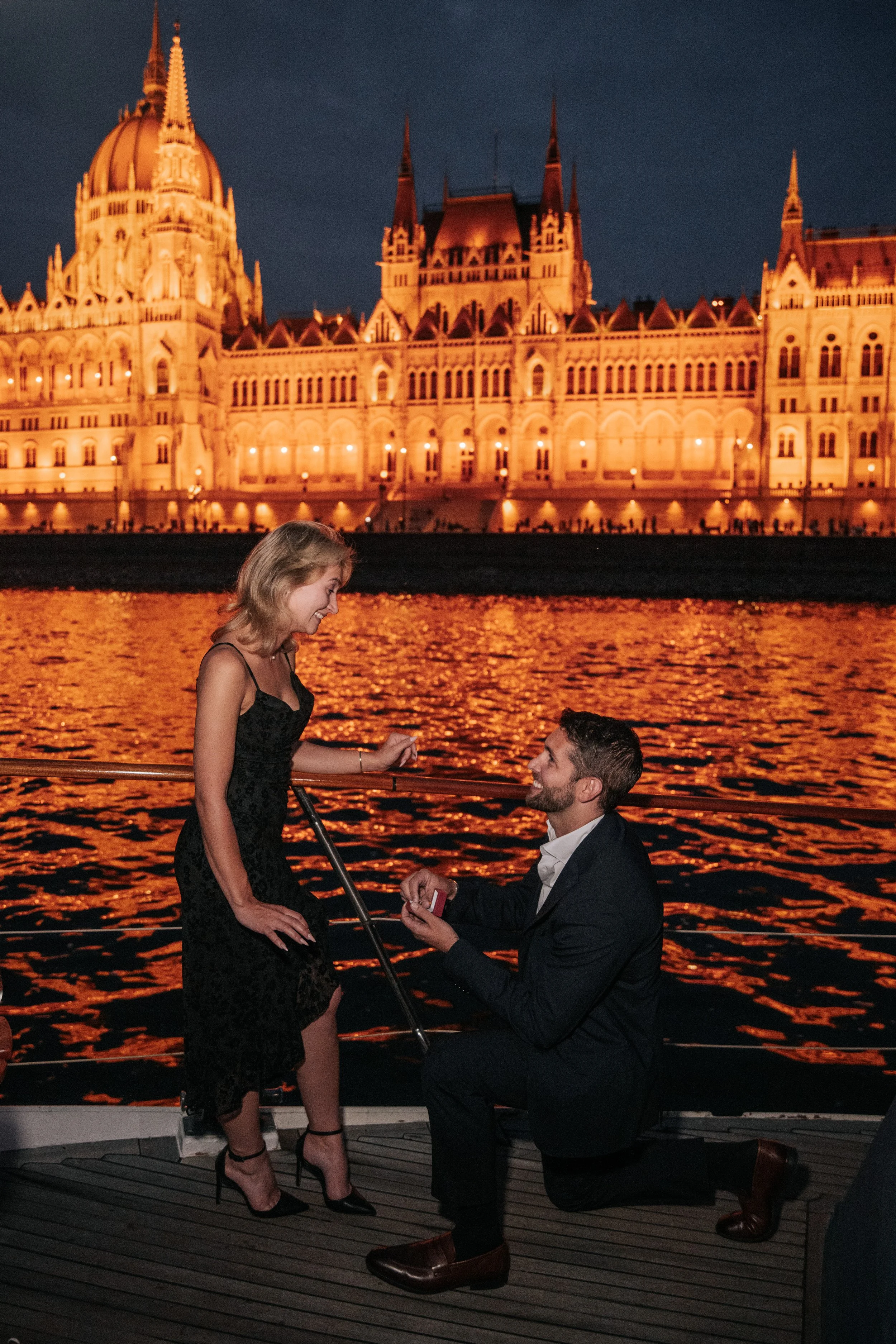 The proposal moment during a private yacht over the danube in budapest
