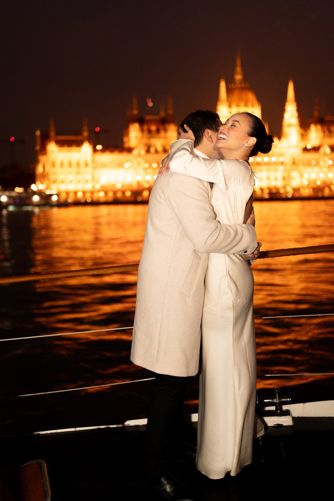 Couple celebrating Budapest Private Yacht Night Proposal with Parliament View Photography and Planning