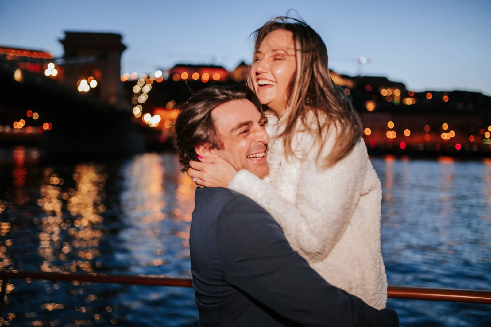 Candid couple moments after a surprising proposal in Budapest
