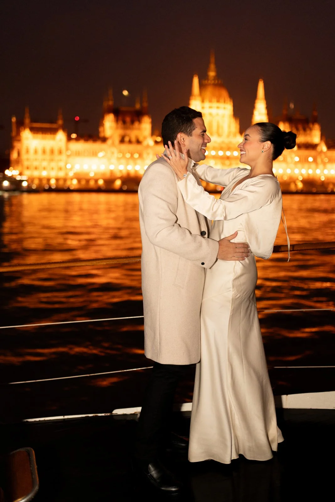 Happy couple during Budapest Private Yacht Night Proposal with Parliament View Photography and Planning