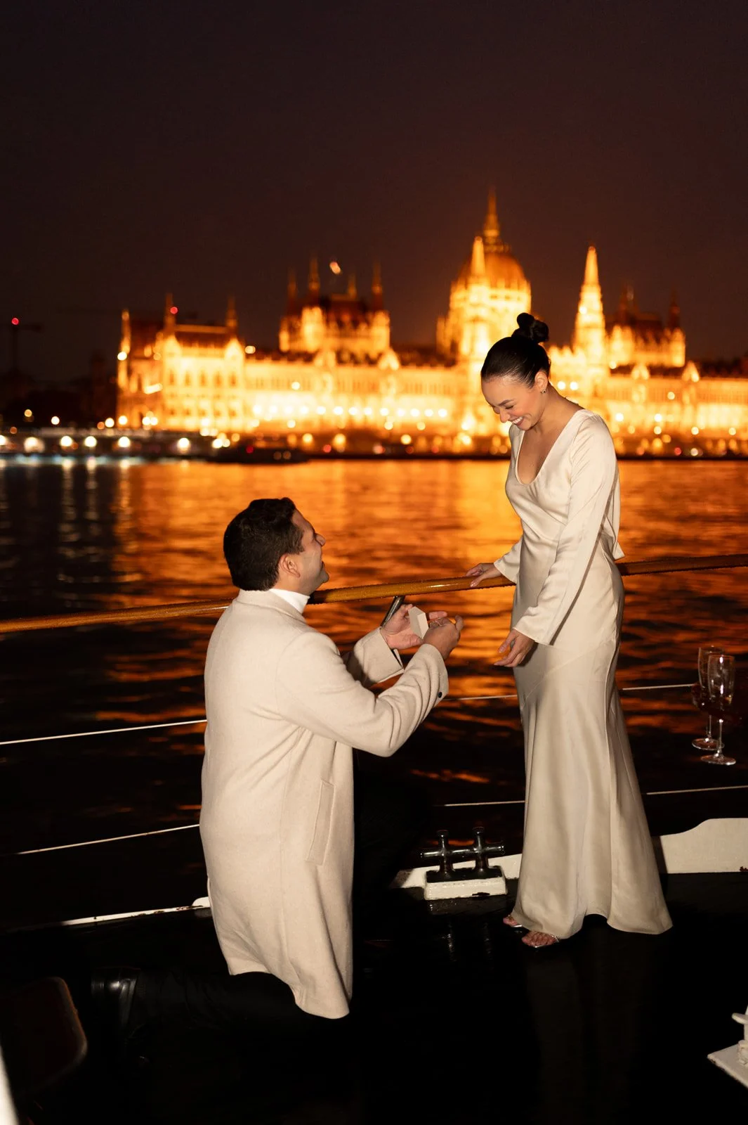 The proposal moment - Budapest Private Yacht Night Proposal with Parliament View Photography and Planning