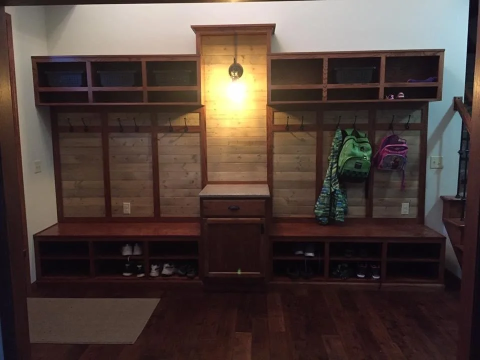 12 foot foyer bench system with backing and hooks installed.