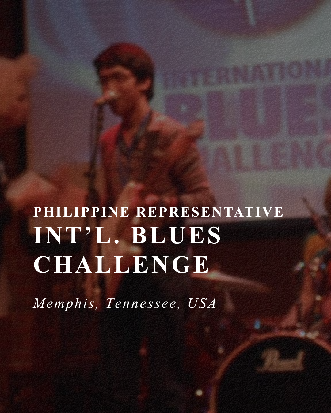 A person in a suit speaking at the Philippine representative event of the INT'L. BLUES CHALLENGE in Memphis, Tennessee, USA.