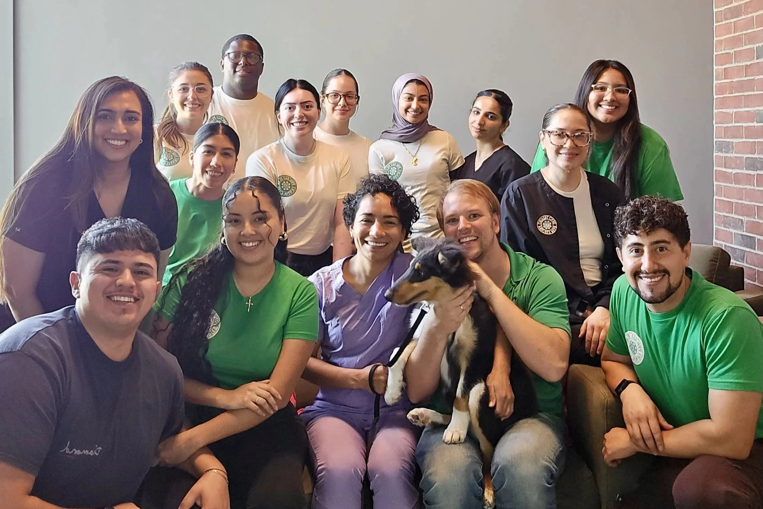 Dr. Flores, our staff, our volunteers, and Ranger the dog pose for a photo after our first-ever Prickly Pear Community Care event.