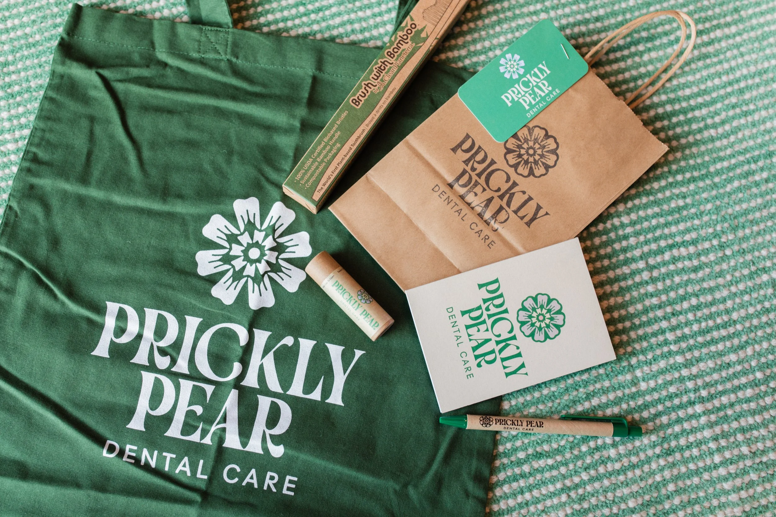 A selection of sustainability-minded items often found in the goody bags offered after appointments at Prickly Pear Dental Care.