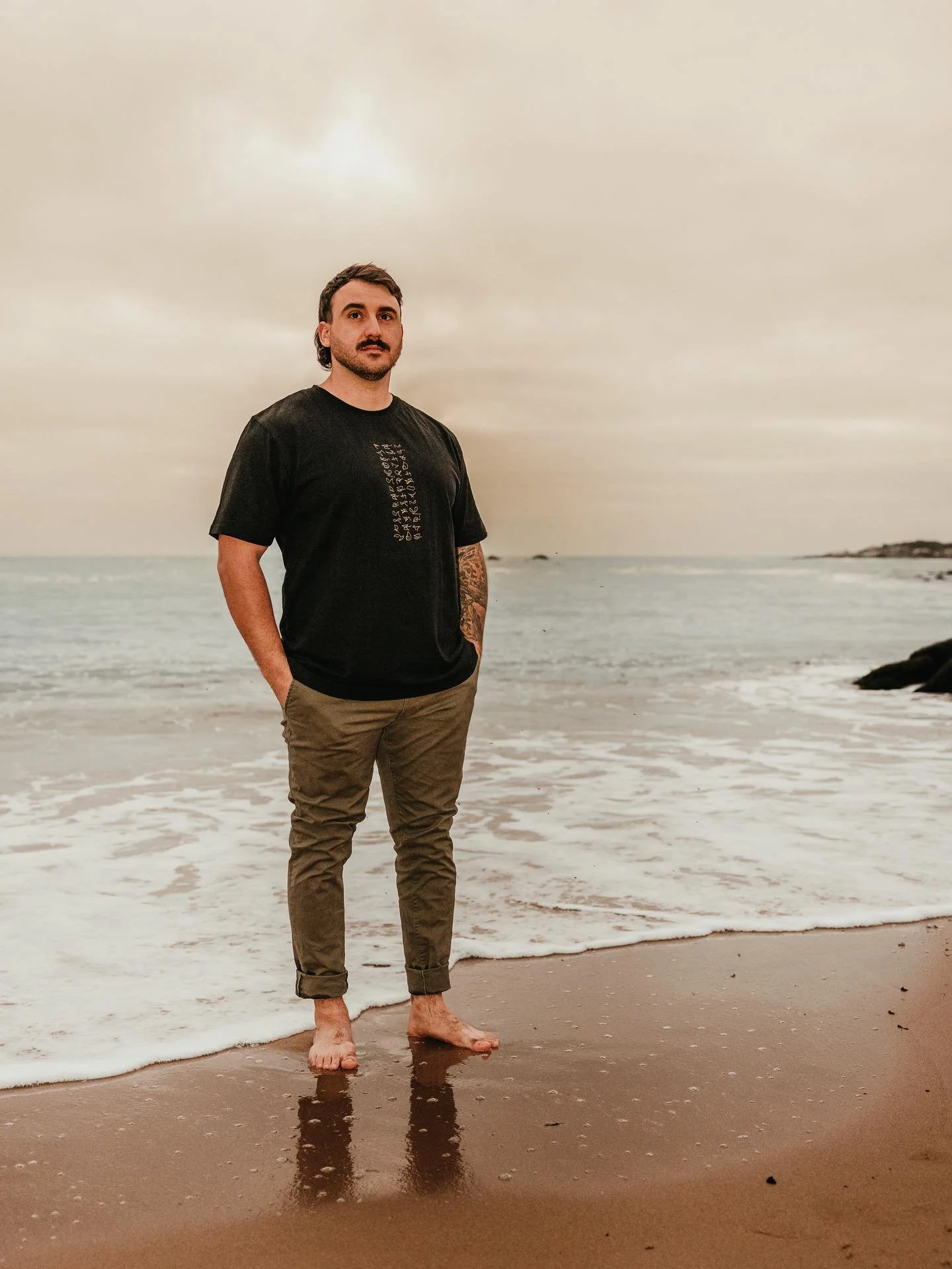 Honouring the ones who protect and heal. 
Our hemp and organic cotton tees are imprinted with light language &ndash; woven with intention to support those working quietly to lift grief and restore balance to our oceans.

To the protectors and healers