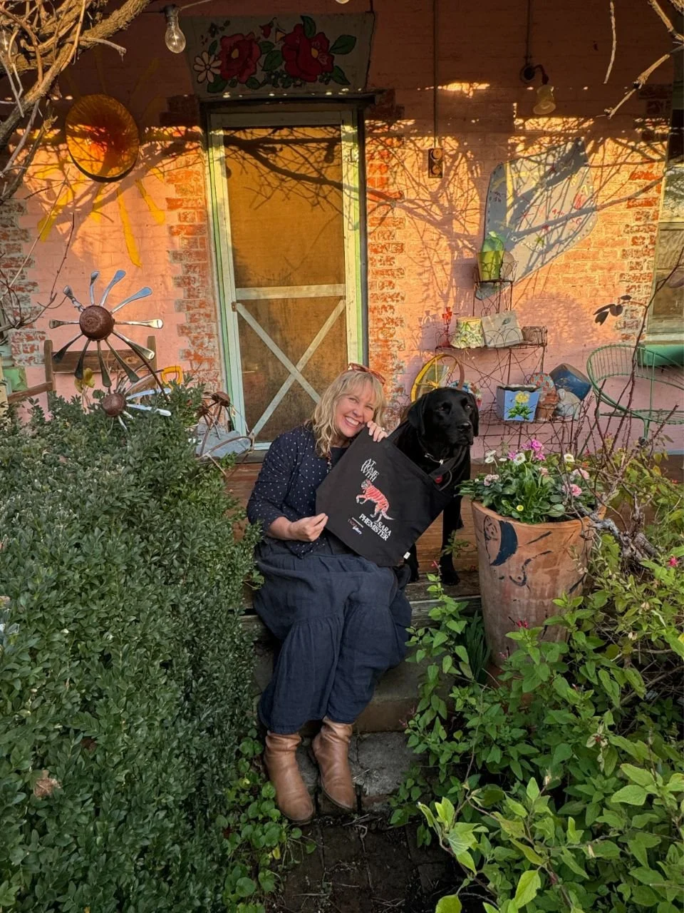 Sara Phemister sat on her front steps holding a bag.