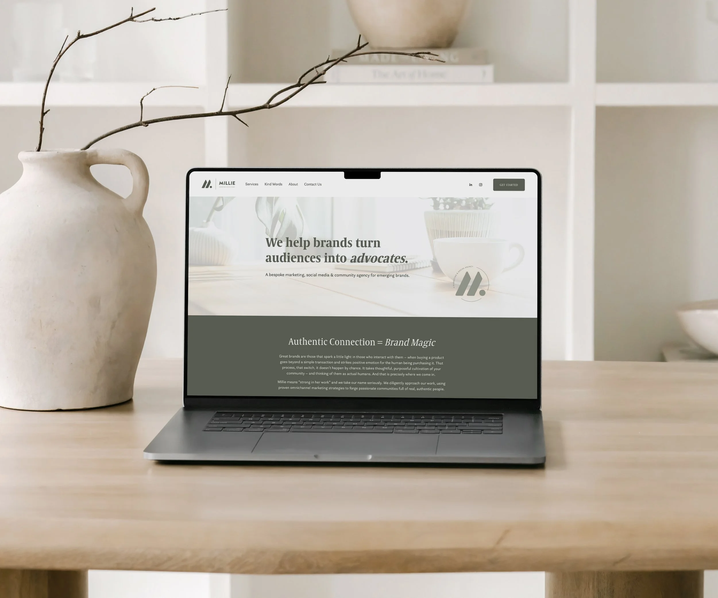 Laptop on a desk with a website homepage depicting how to rank your site on Google
