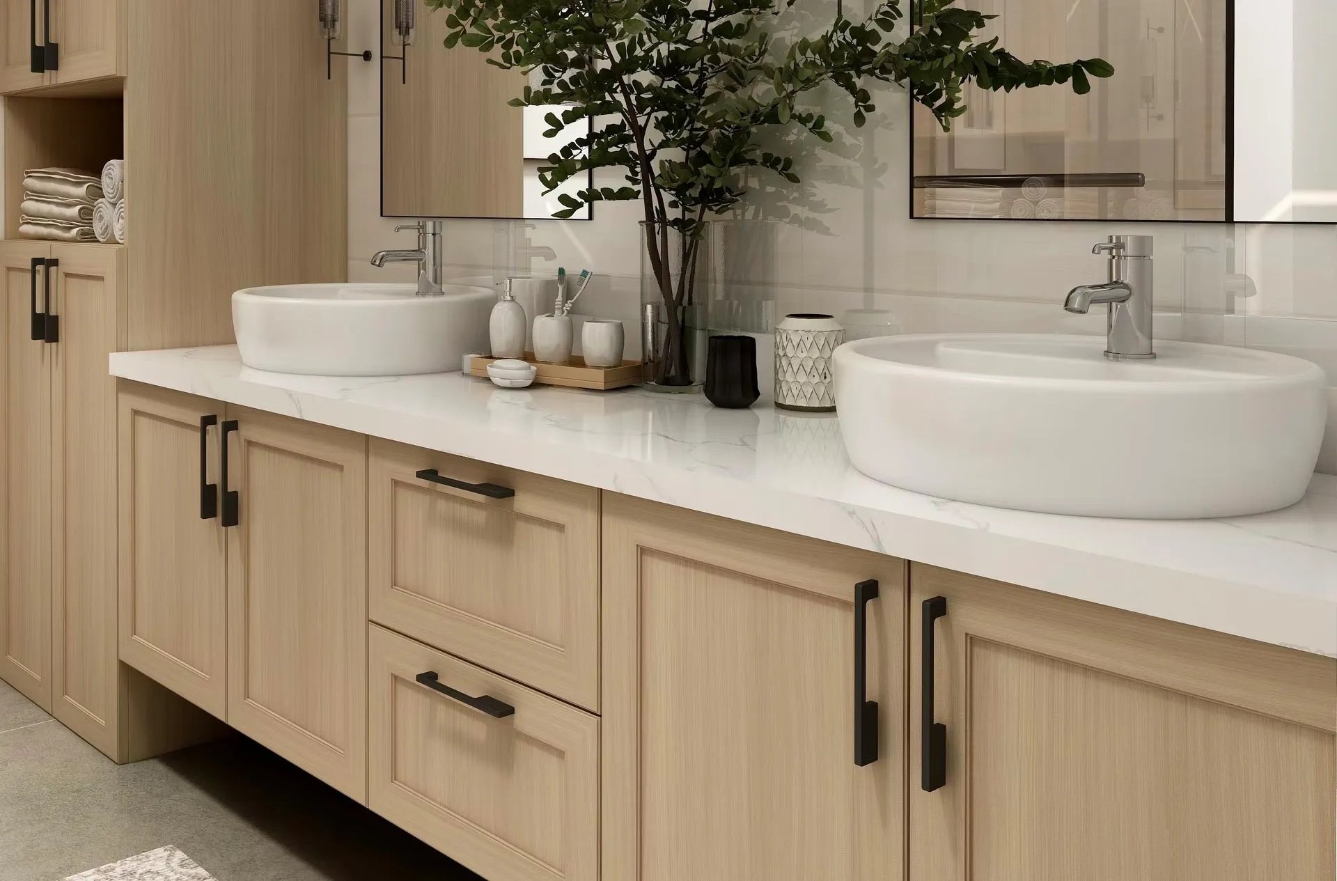 Modern bathroom with two round white sinks on a beige wooden vanity, large mirrors, a plant, and decorative toiletries on the counter.