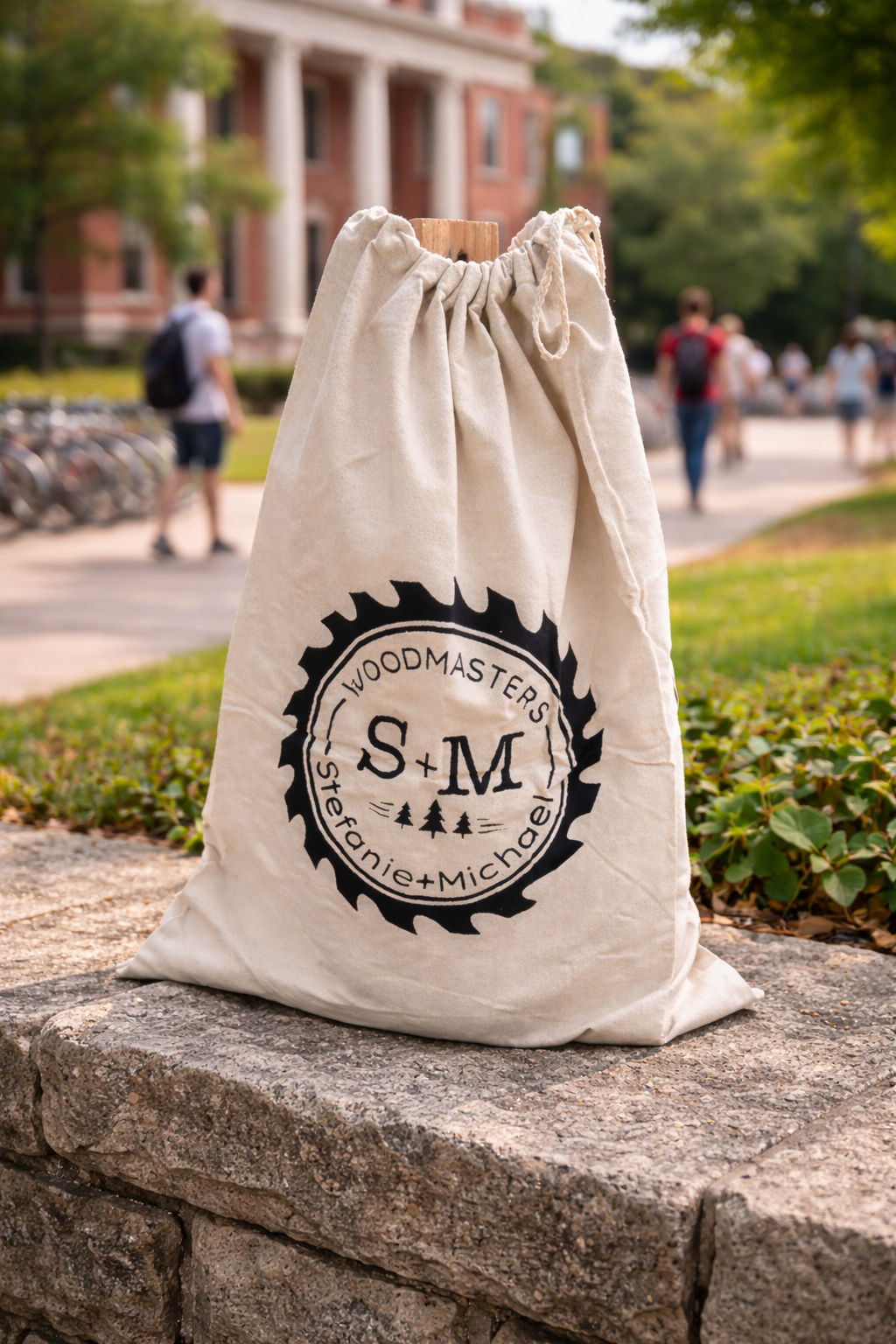 Signature canvas Roll-Out Table carry bag on a college campus with students and academic buildings in the background (Copy)