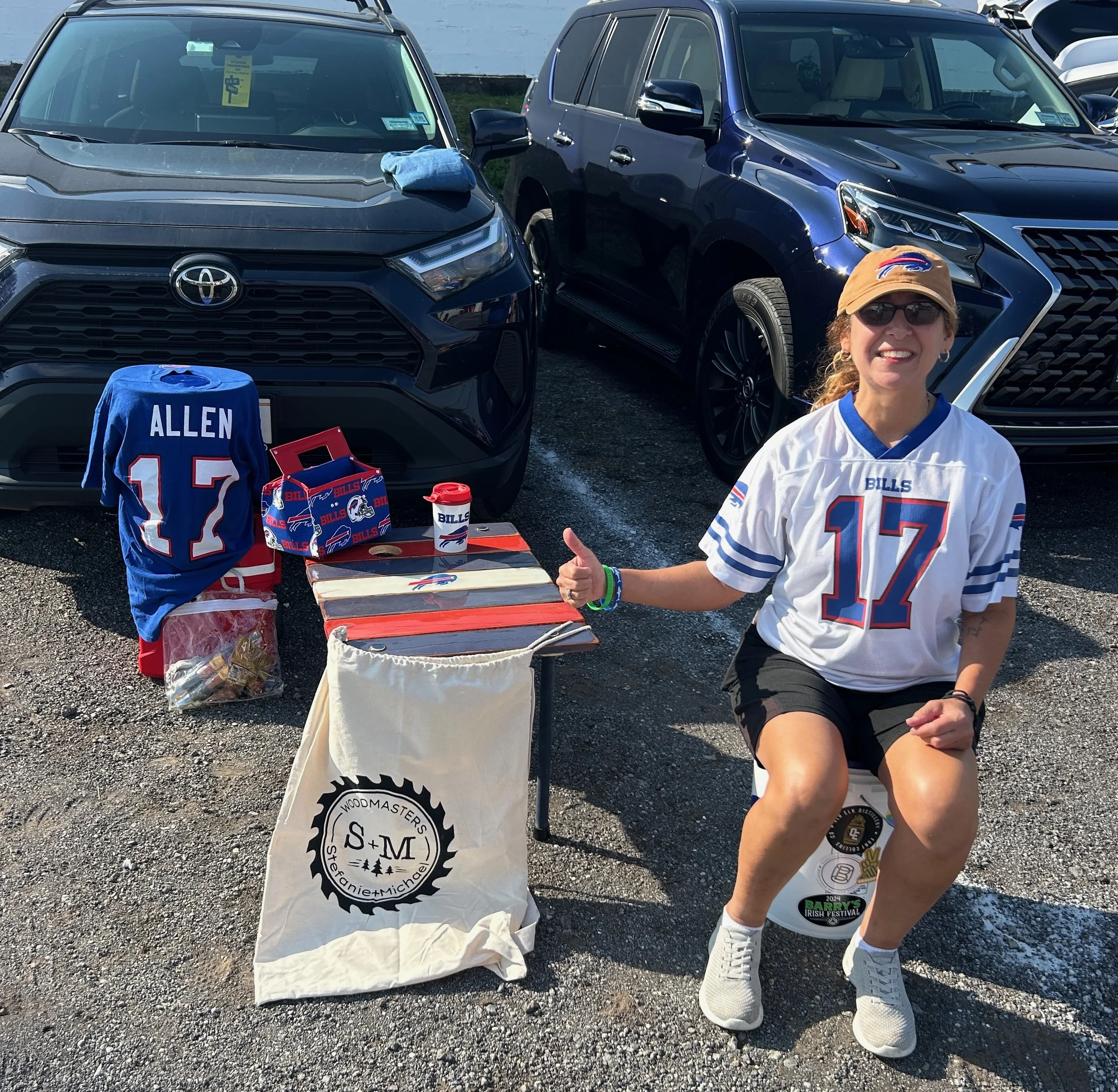 a NY buffalo bills roll out table in a bag with a female fan tailgating