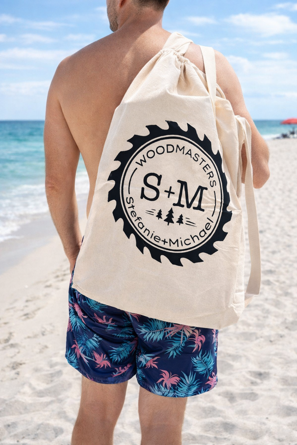 a white man holding S & M woodmasters signature bag for their roll up tables in a bag (Copy)