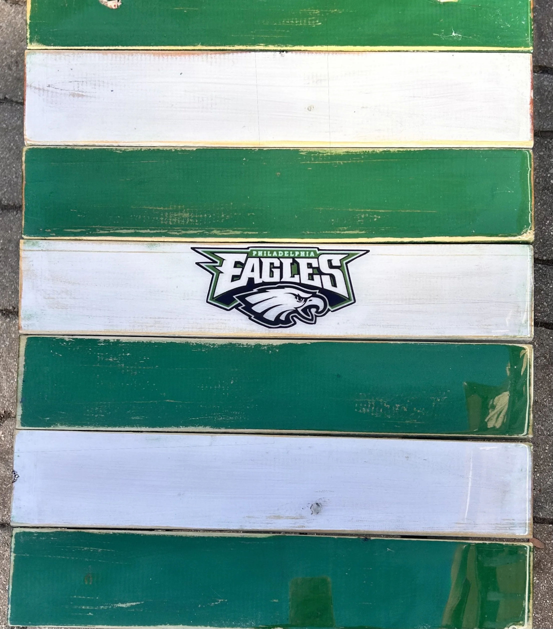 a close up of a handmade eagles football potable table