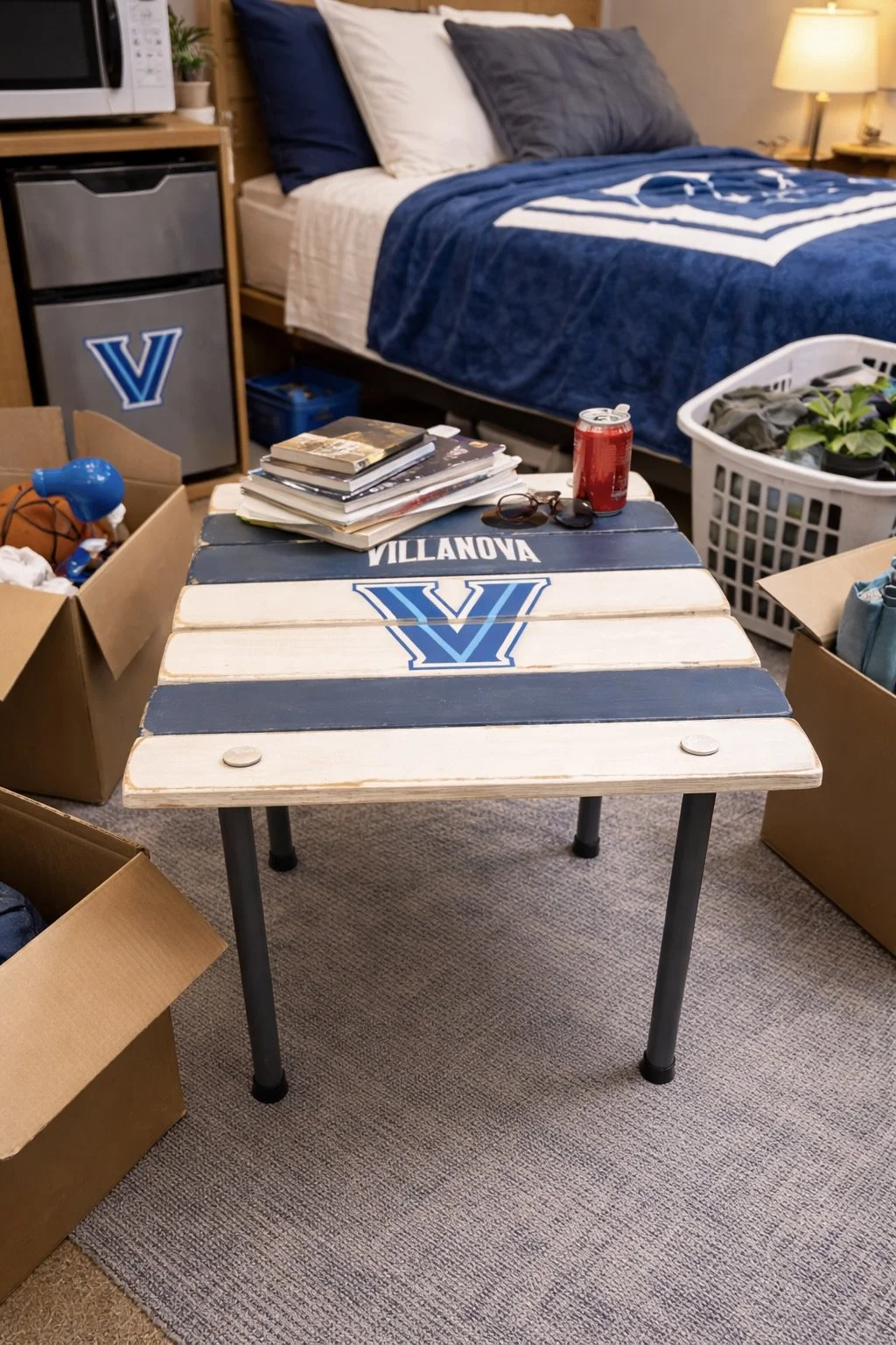 Villanova roll-out table on campus with female student studying, portable cedar table with water bottle, perfect for dorm rooms and outdoor college use on moving in day