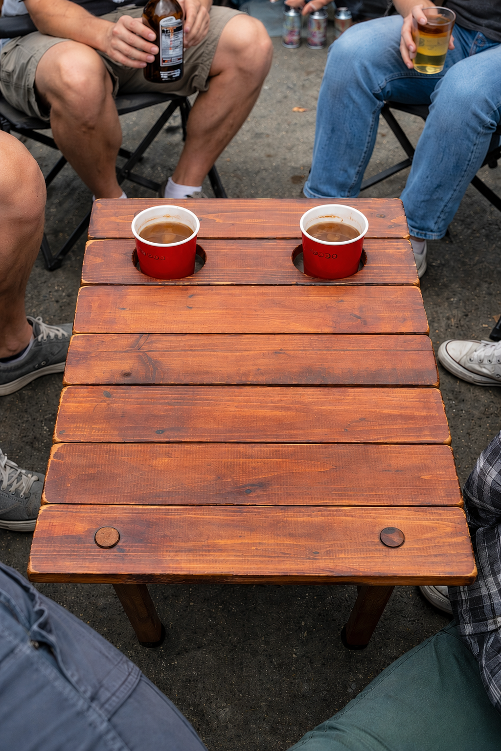 brown-portable-camping-table-with-cup-holders.jpeg