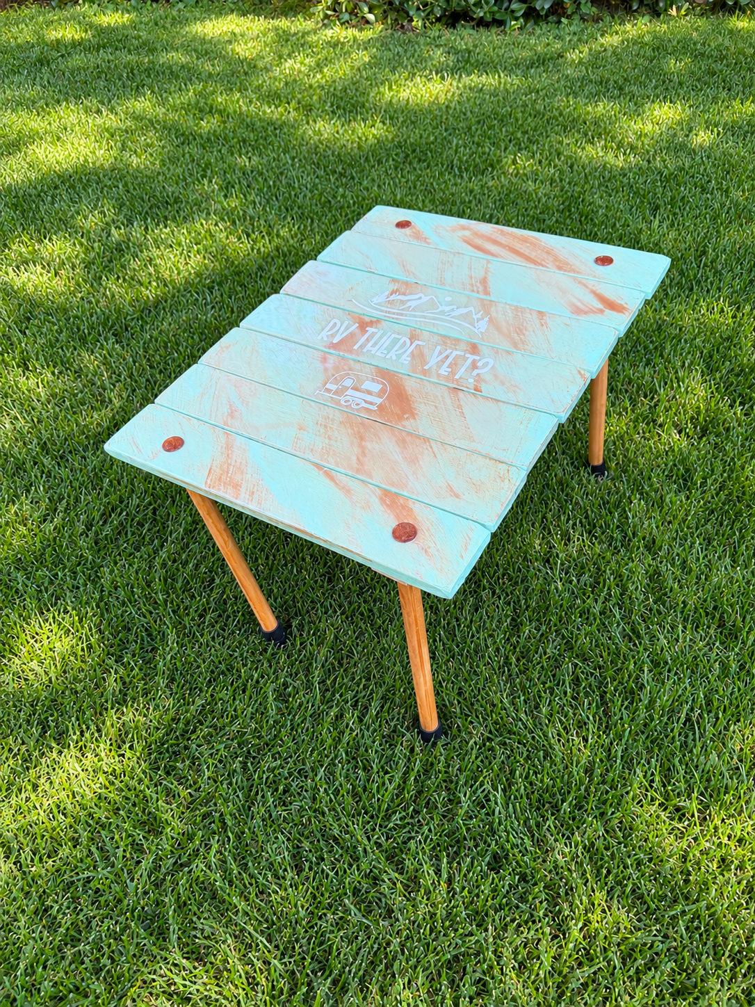 Rustic RV-Themed Camping Table on Grass.png