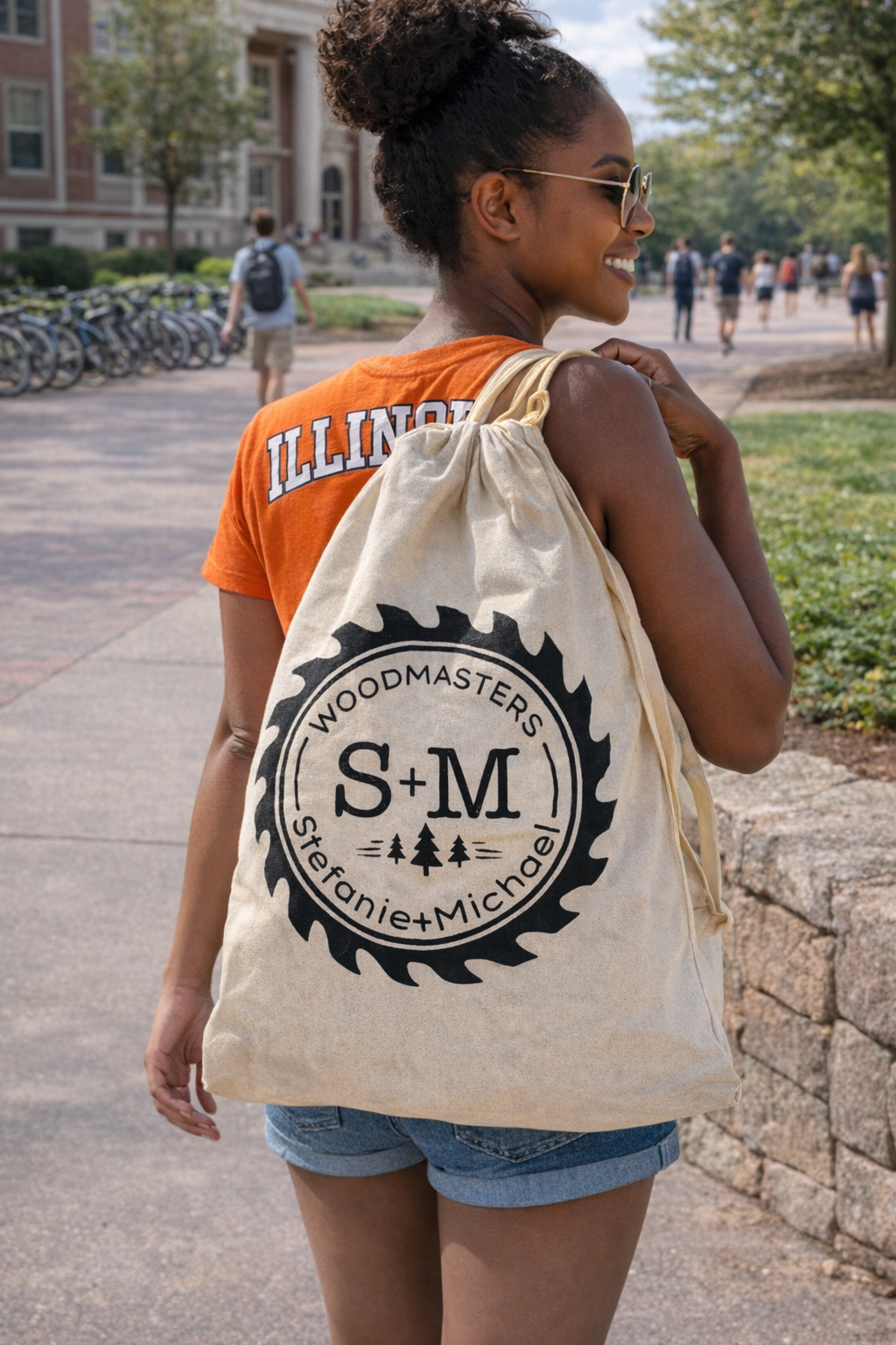 Signature canvas Roll-Out Table carry bag worn on a college campus by a student