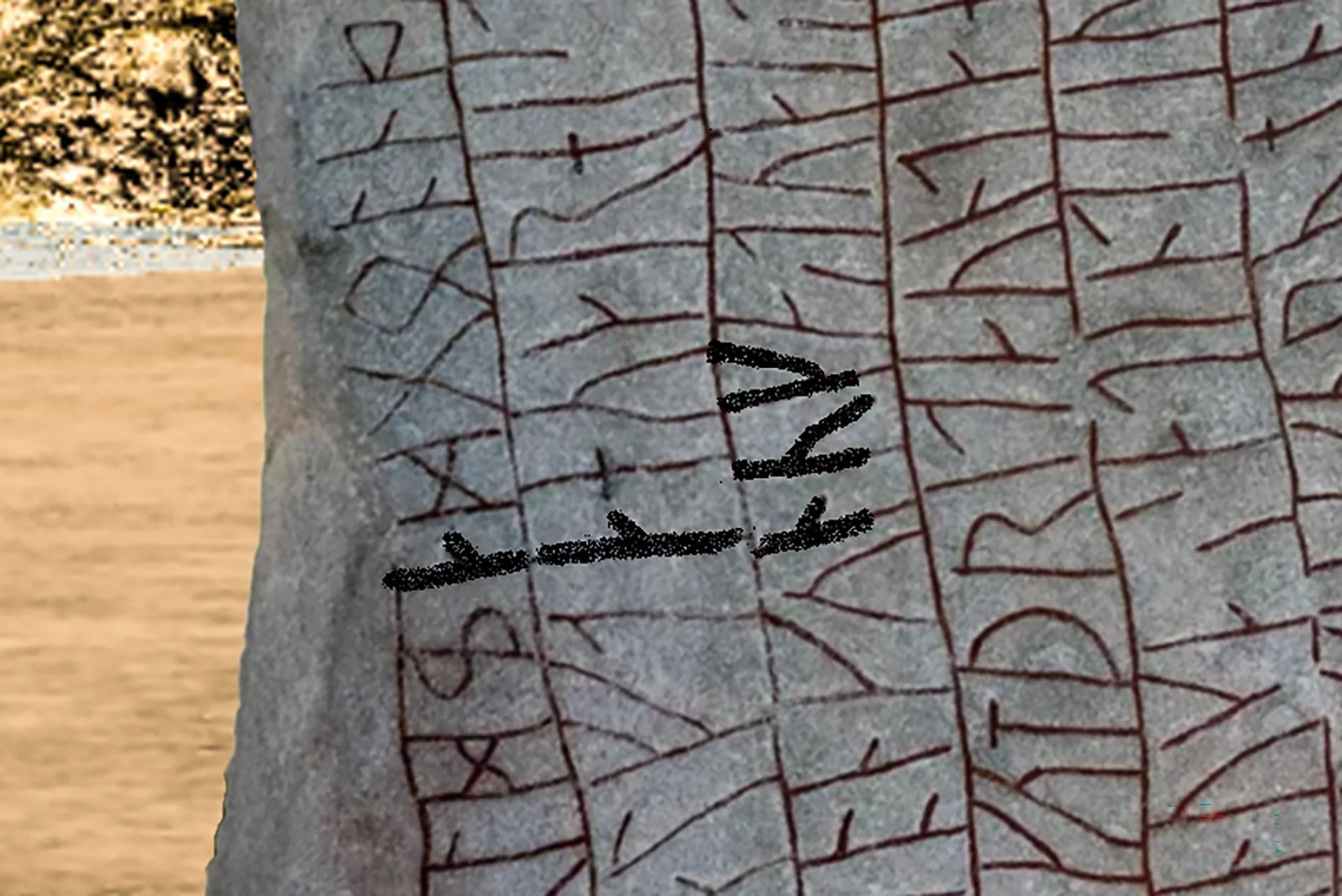 A charcoal tracing on the runestone