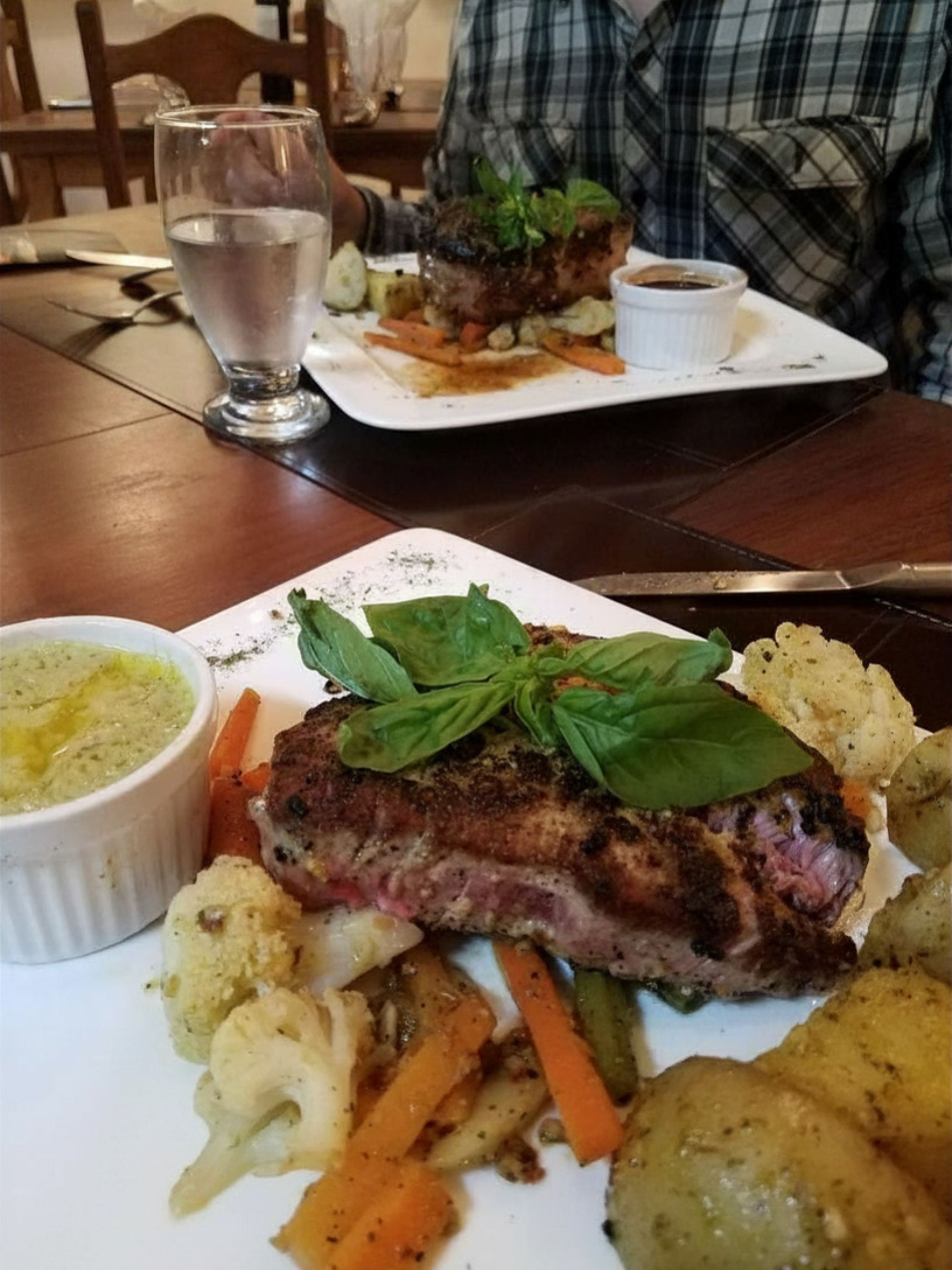 Steak dinner with roasted potatoes, cauliflower and carrots at a restaurant in Monteverde, Costa Rica.