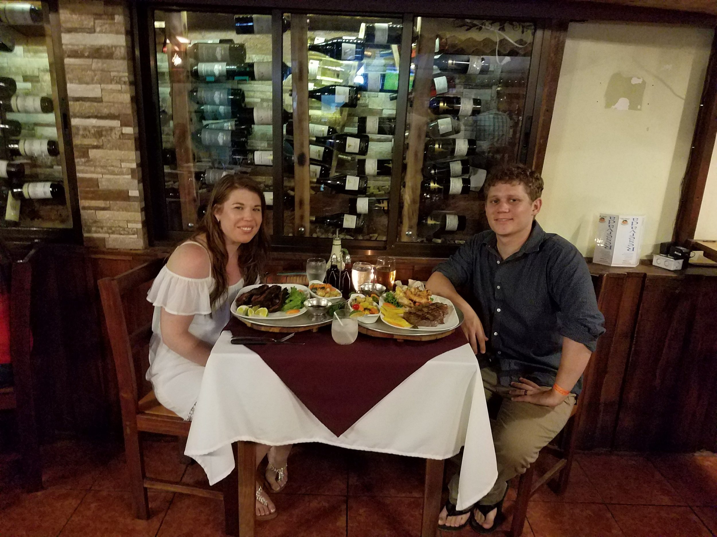 Couple dining at restaurant La Fortuna Costa Rica steak wine
