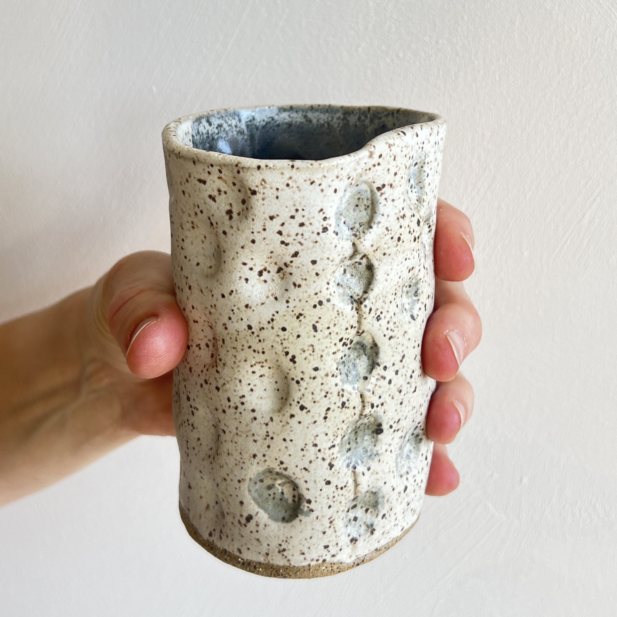 DimpledTallMug-InHand-2.jpg