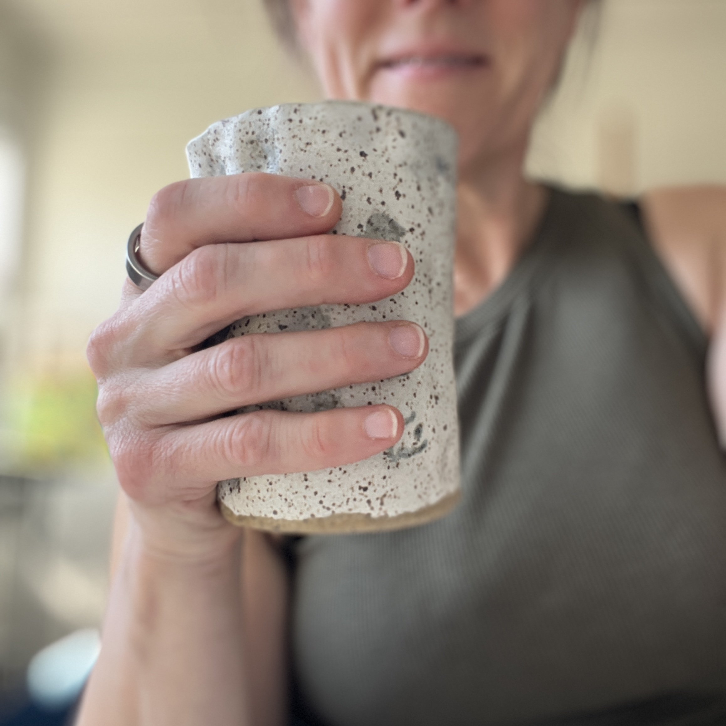DimpledTallMug-InHand-1.jpg