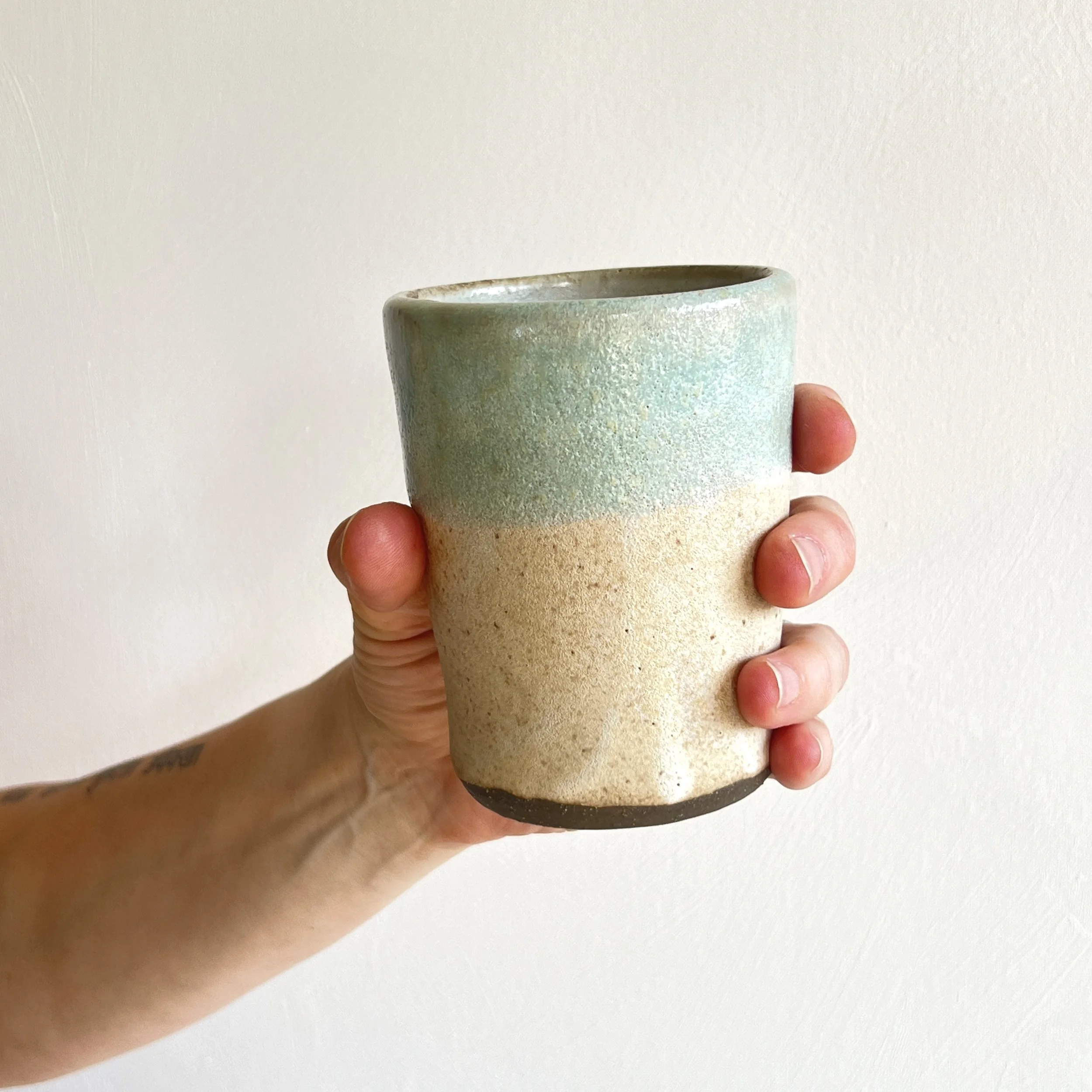 TallBlueTanCup-InHand-1.jpg