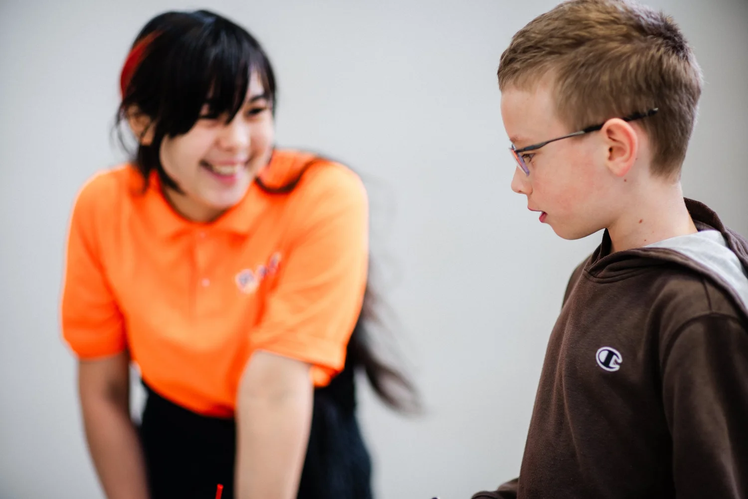 An instructor working one on one with a child