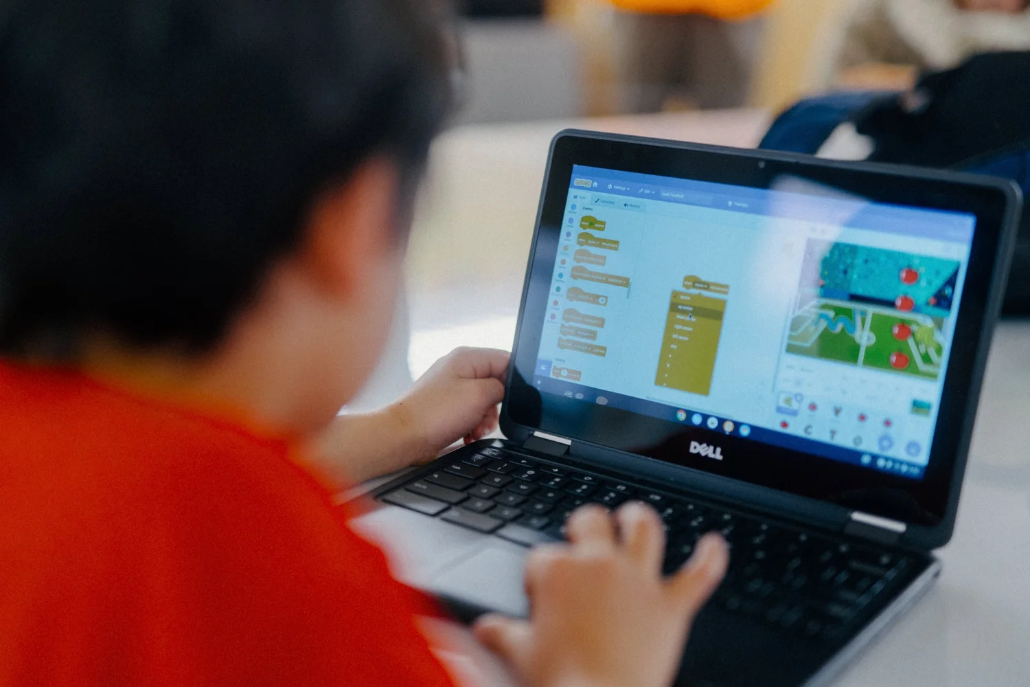 Campers building at a Journey to STEAM summer camp