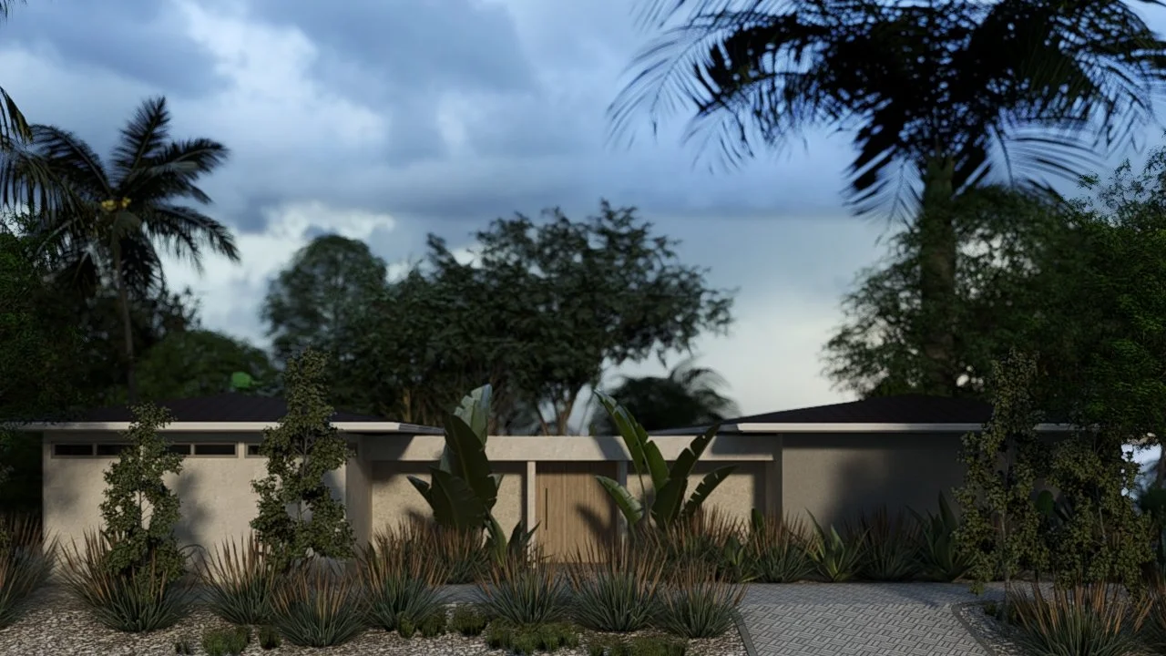 Modern single-story house with a flat roof, surrounded by tropical plants and trees, under a cloudy sky.