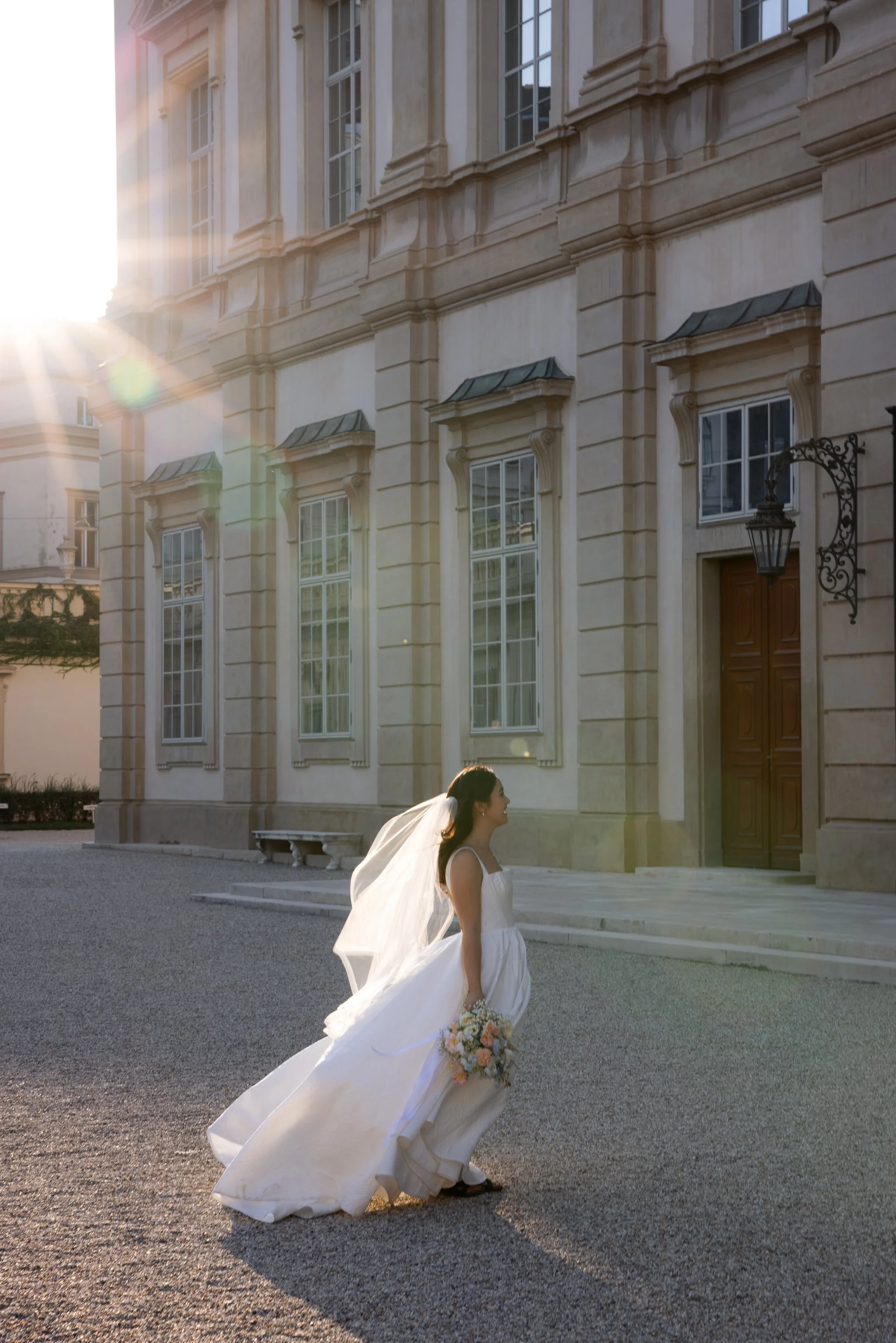 Wedding photographer Vienna — couple on the palace staircase