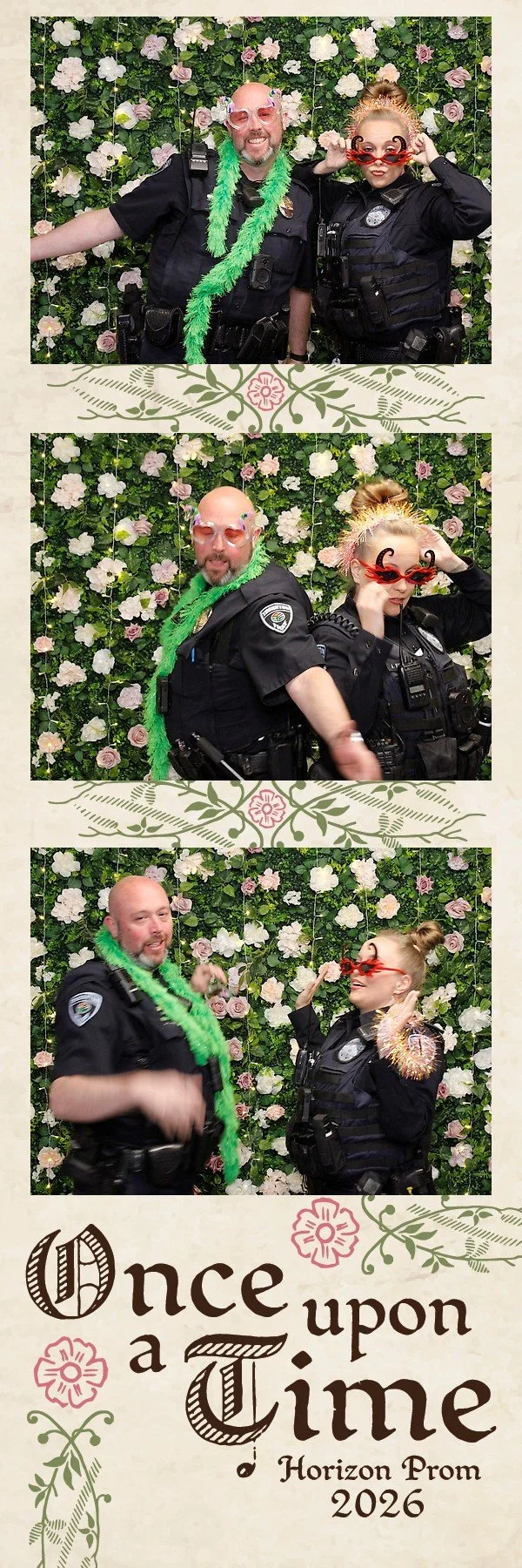 Three police officers posing in front of a floral backdrop, wearing humorous accessories like colorful glasses and green feather boas, with the caption 'Once upon a Time Horizon Prom 2026' at the bottom.