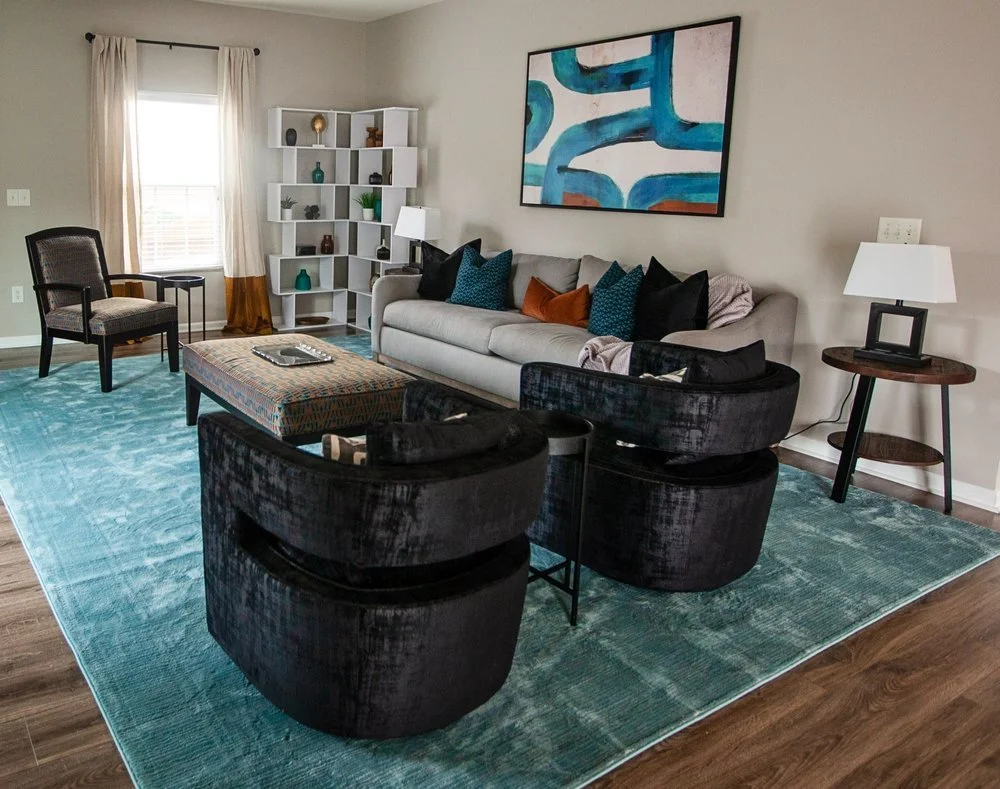 Cozy colorful living area styled for connection, calm, and quiet sophistication by Marlaya Ross of Studio One Nine Interior Design.