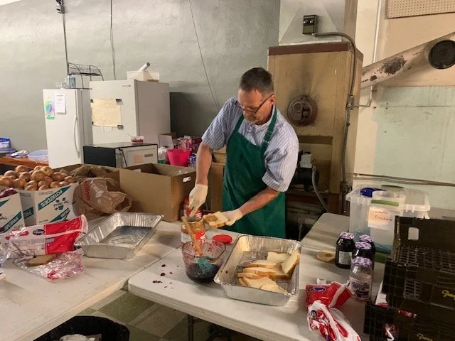 Preparing food fresh food at Manfisher Ministries in Omak, WA