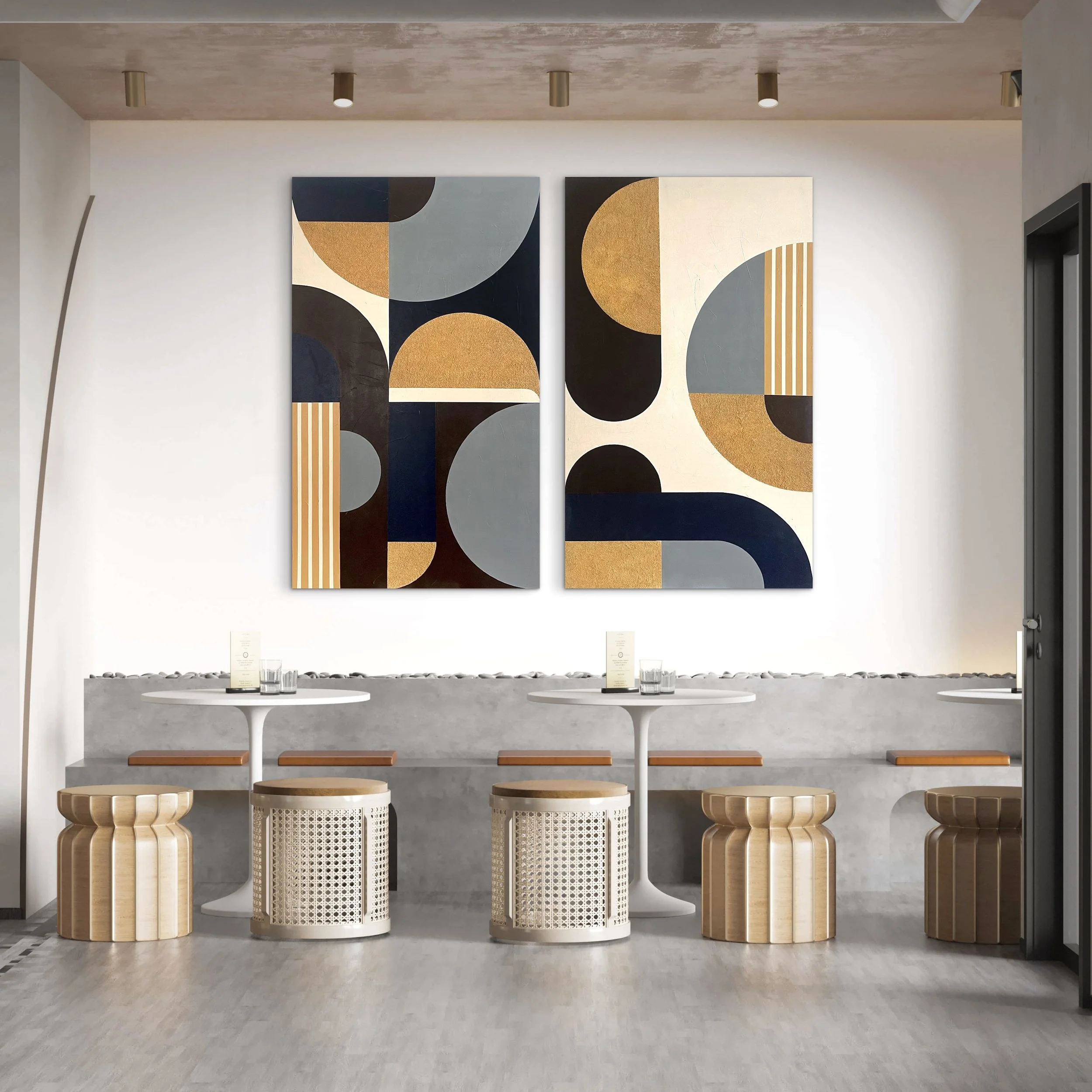 Interior of a modern minimalist room with two abstract geometric paintings on the wall, tables with glasses and menus, and wooden stools with patterned sides.