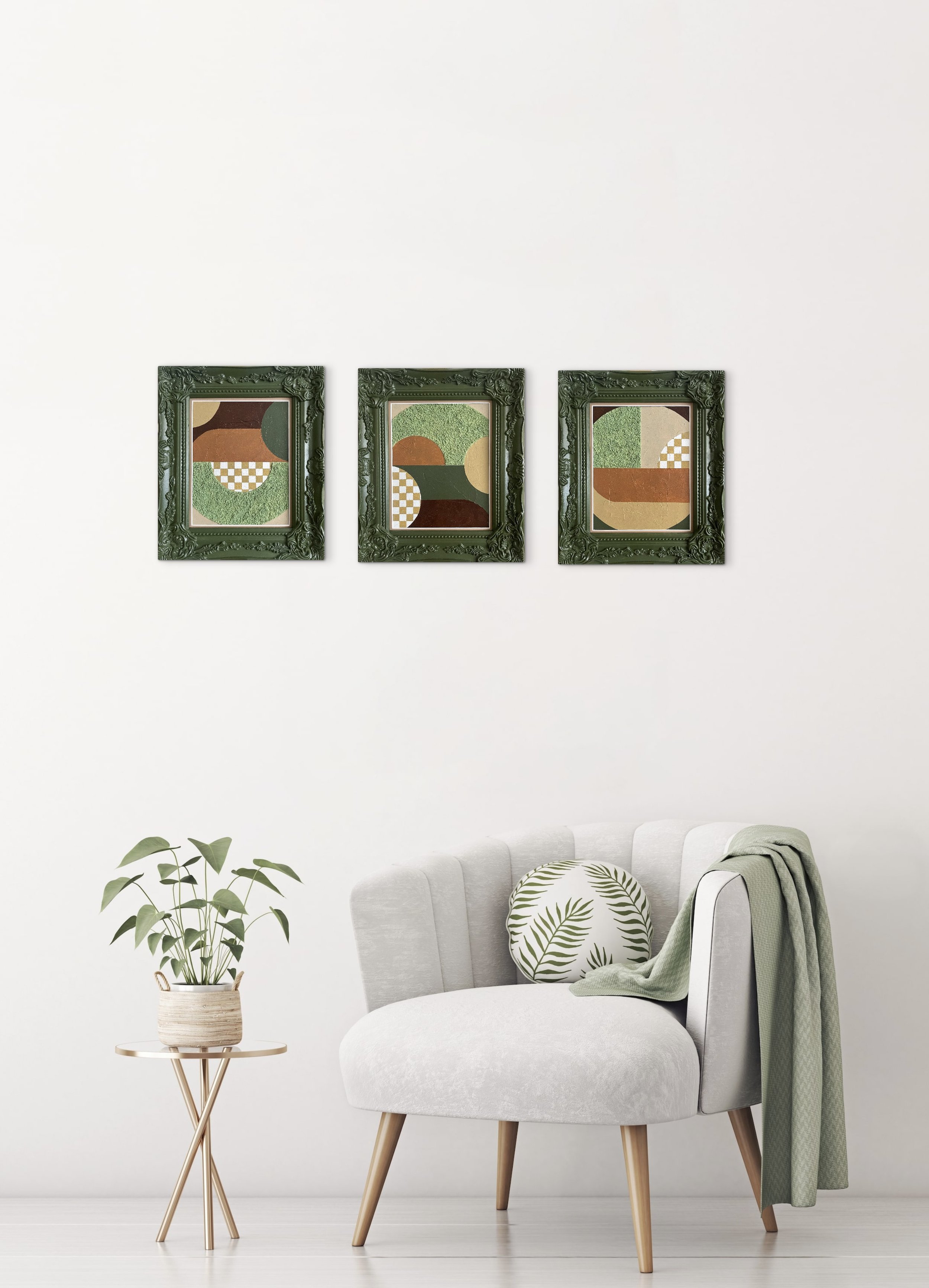 A cozy living room corner with a light gray armchair, a round wooden side table with a potted plant, and three framed abstract art pieces with green frames hanging on the wall.