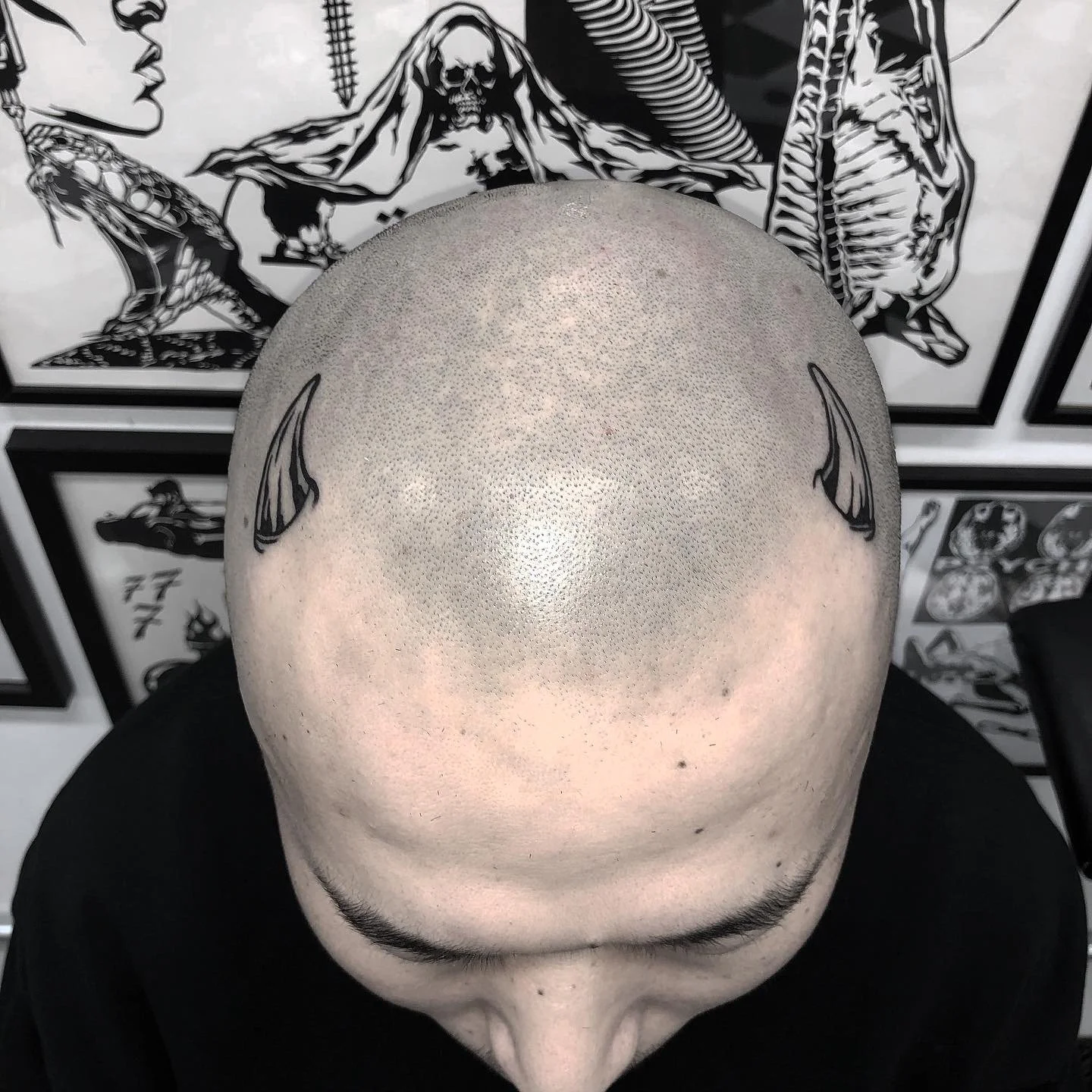black work/Brooklyn NYC totem head tattoo devil's horns tattoo