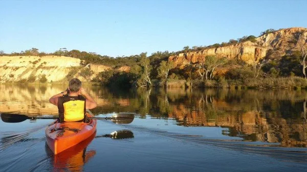 Father Dave on his trip down the Murray, where he engaged with vulnerable communities.
