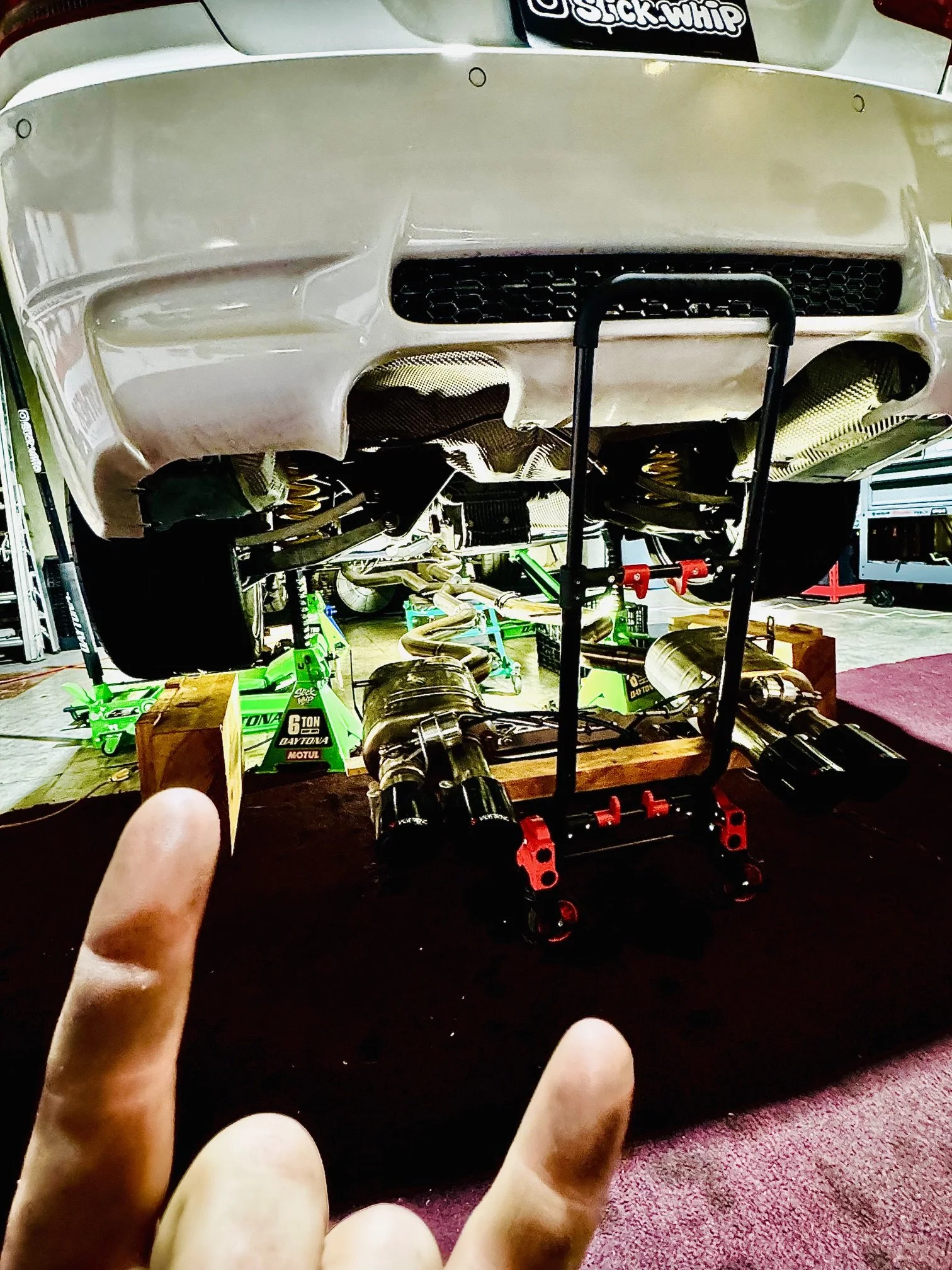 Exhaust instastall M3 in shop.jpeg